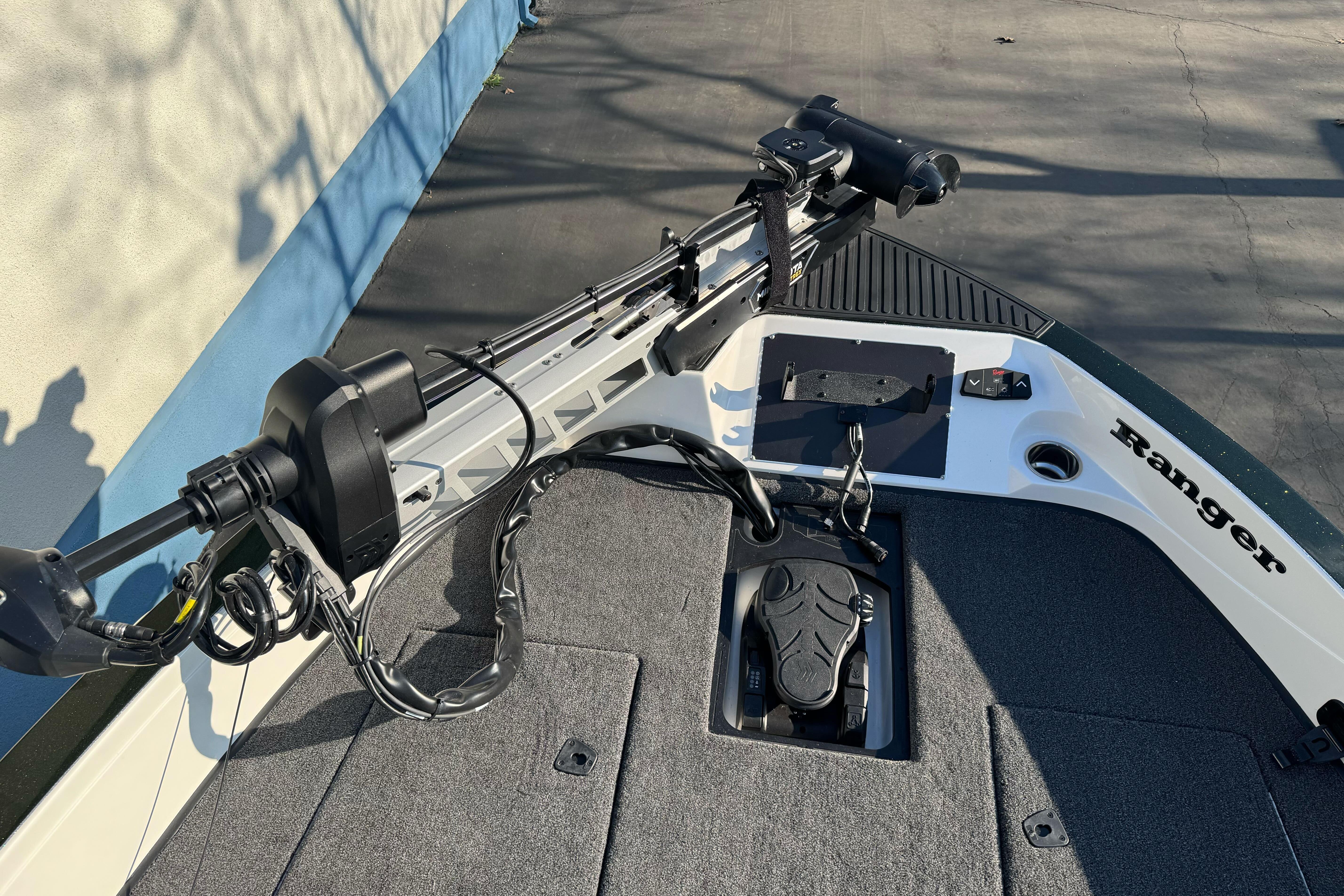 2026 Ranger 620xFS Pro boat deck with trolling motor and foot pedal.