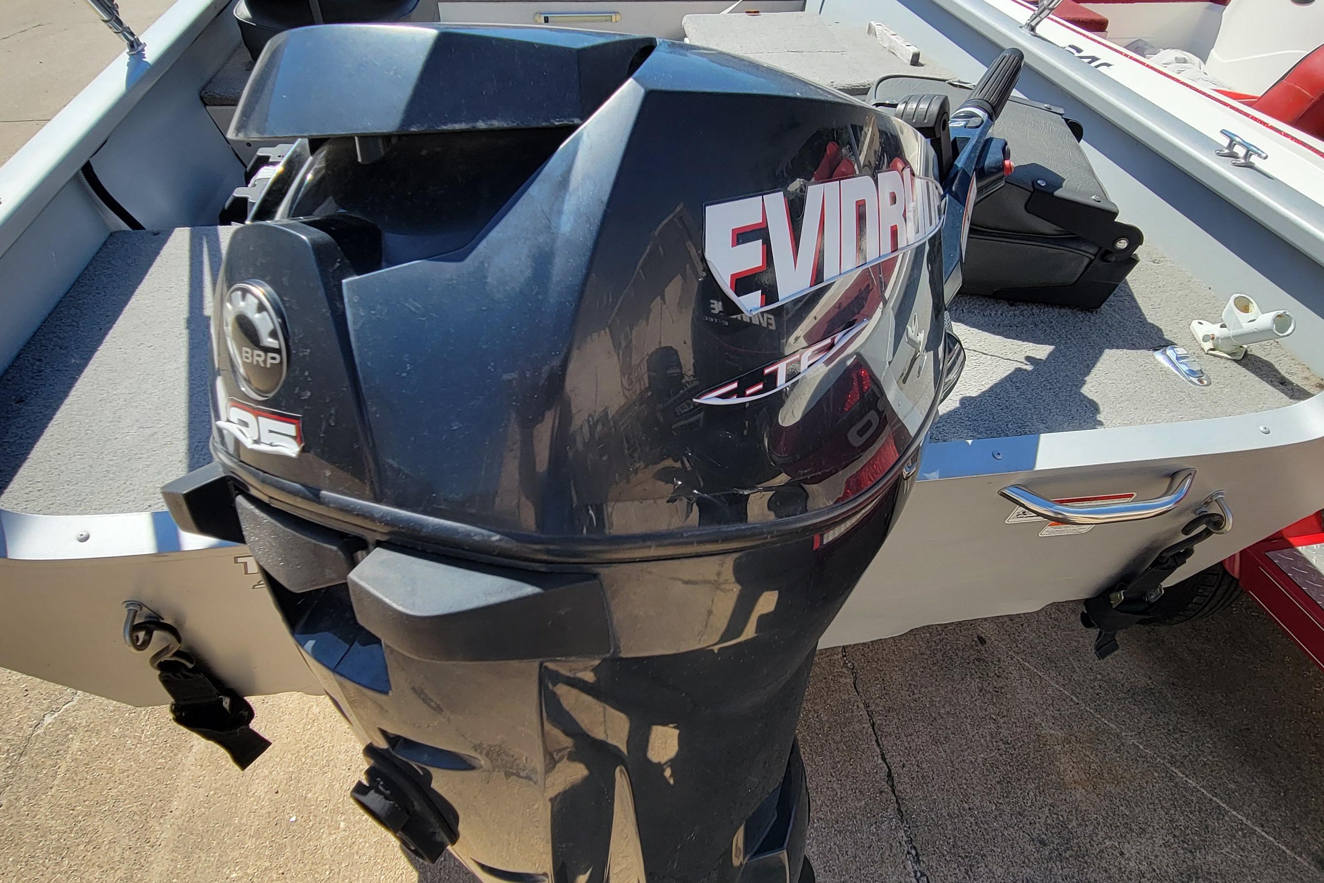 2010 Tracker Guide V 15 Laker boat with Evinrude outboard motor.