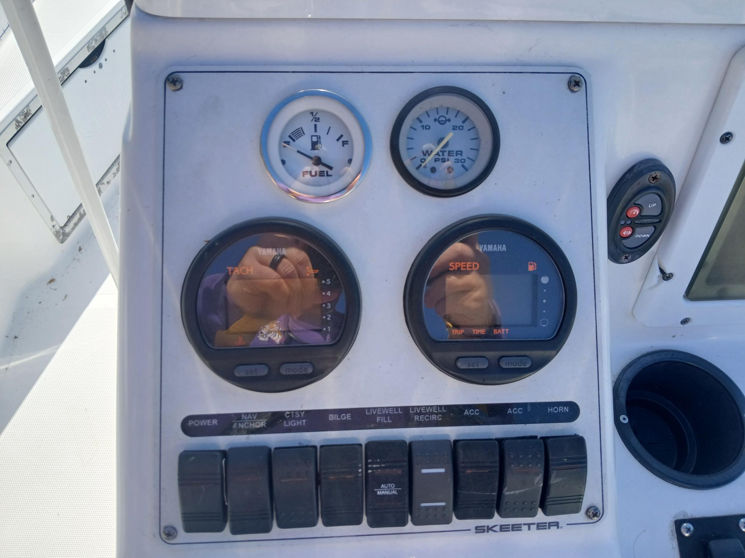 2008 Skeeter 20 ZX boat dashboard with gauges and control switches.