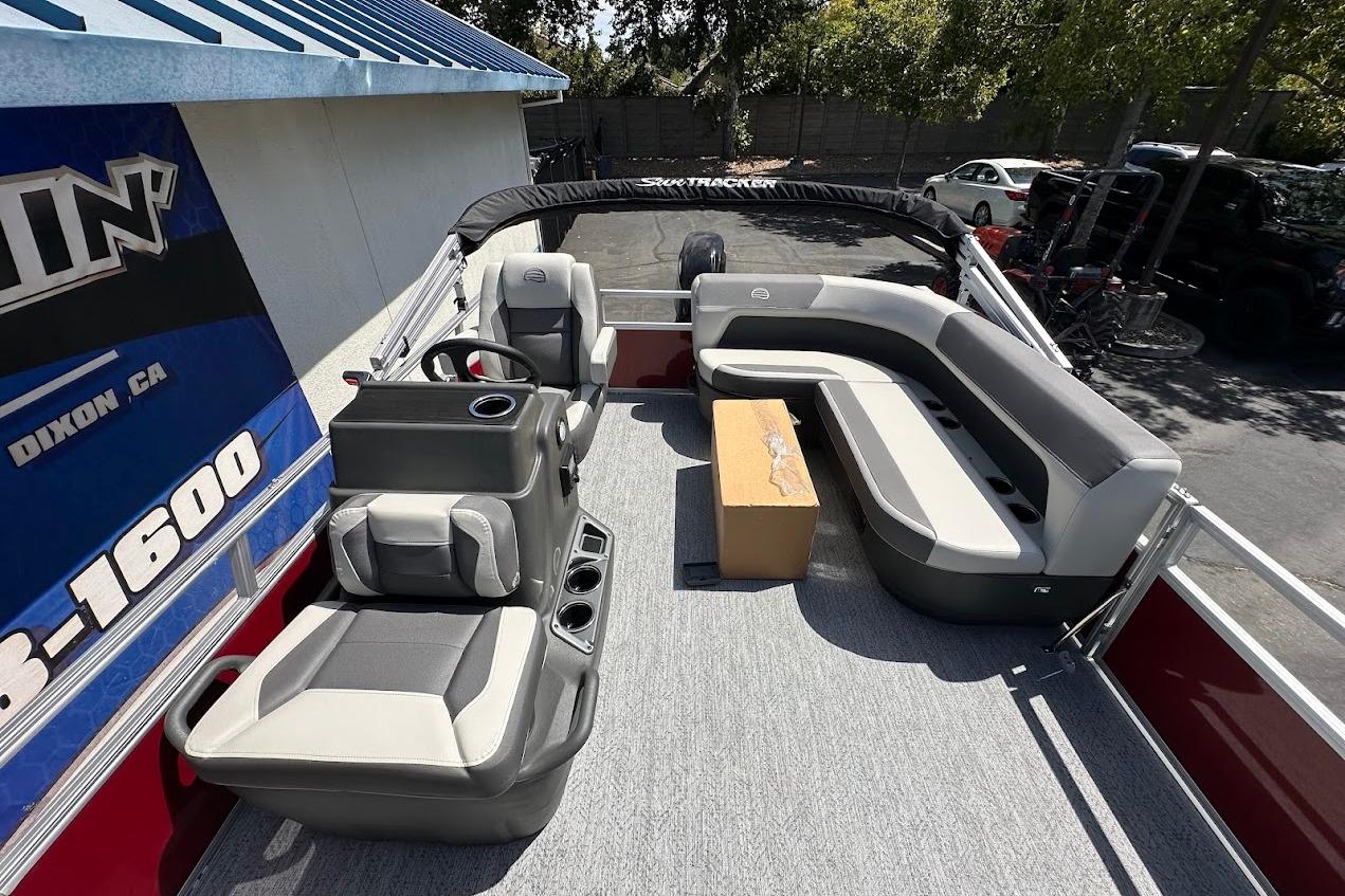 2026 Sun Tracker Bass Buggy 16 XL Select pontoon boat with spacious seating and modern design.