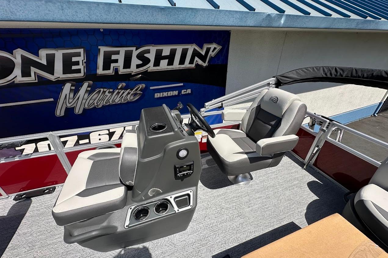 2026 Sun Tracker Bass Buggy 16 XL Select boat interior with steering console and seating.