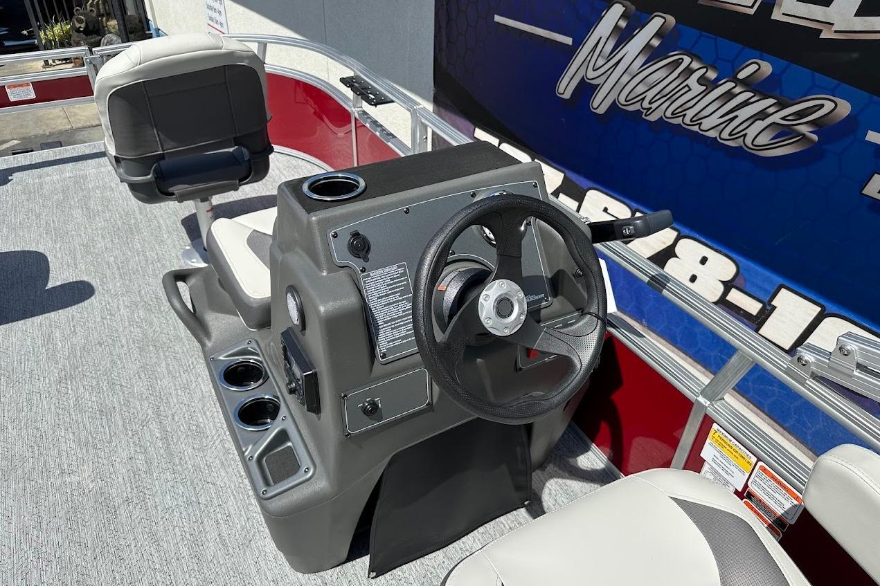 2026 Sun Tracker Bass Buggy 16 XL Select boat interior with steering console and seating.