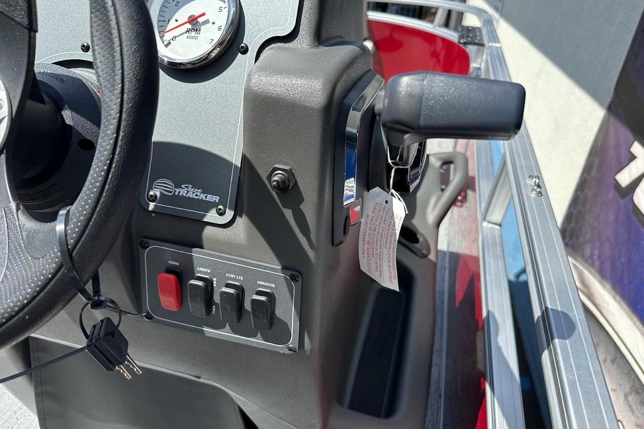 2026 Sun Tracker Bass Buggy 16 XL Select dashboard with steering wheel and control panel.