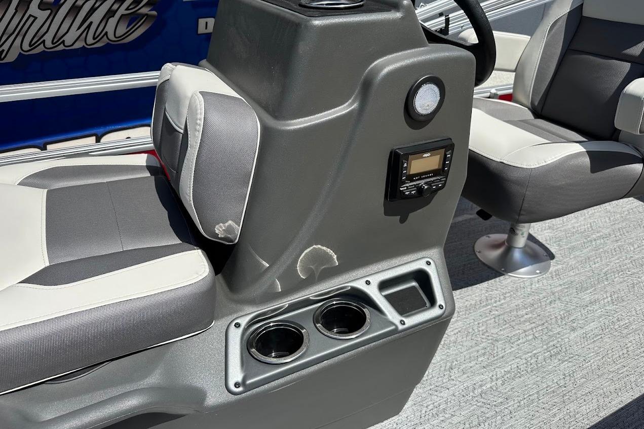 2026 Sun Tracker Bass Buggy 16 XL Select interior with gray seating and control panel.