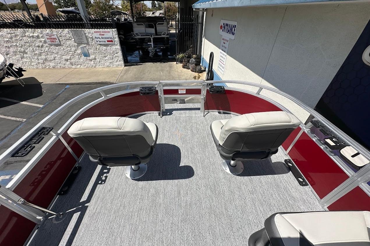 2026 Sun Tracker Bass Buggy 16 XL Select pontoon boat interior with two swivel seats.