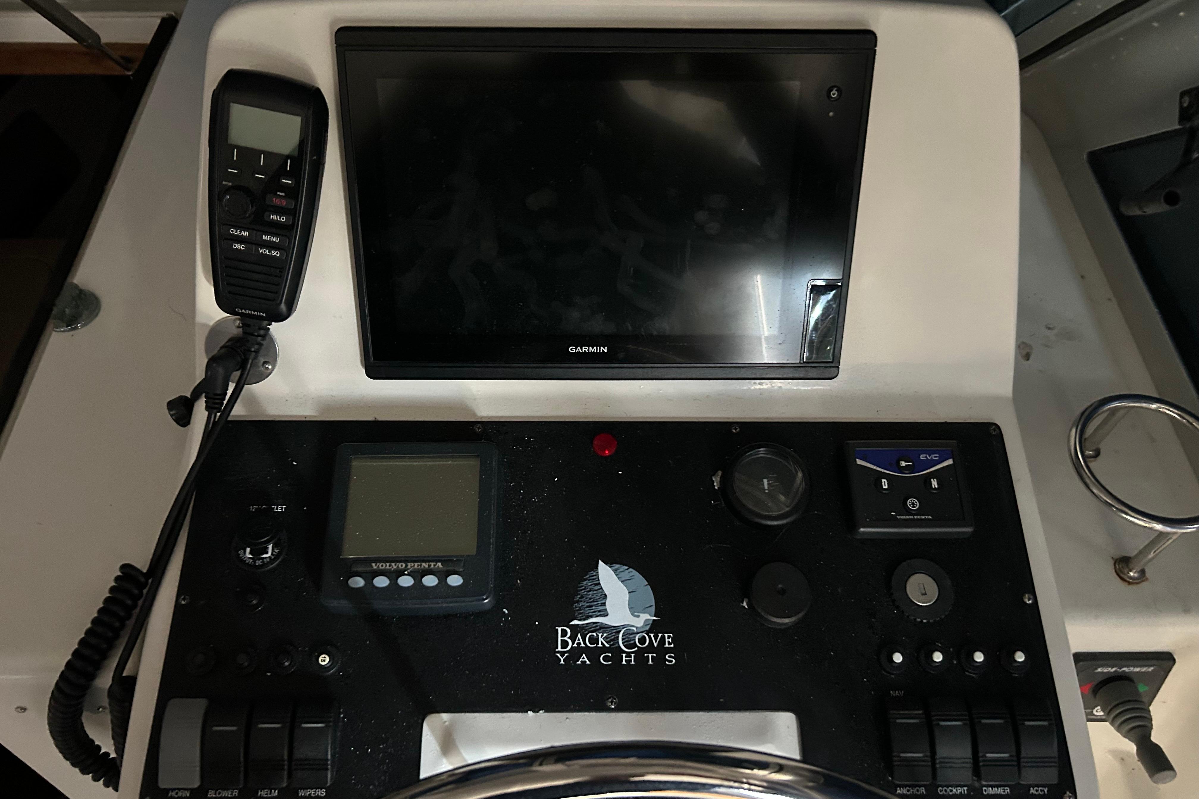 Control panel of a 2006 Back Cove 26 yacht with navigation equipment.