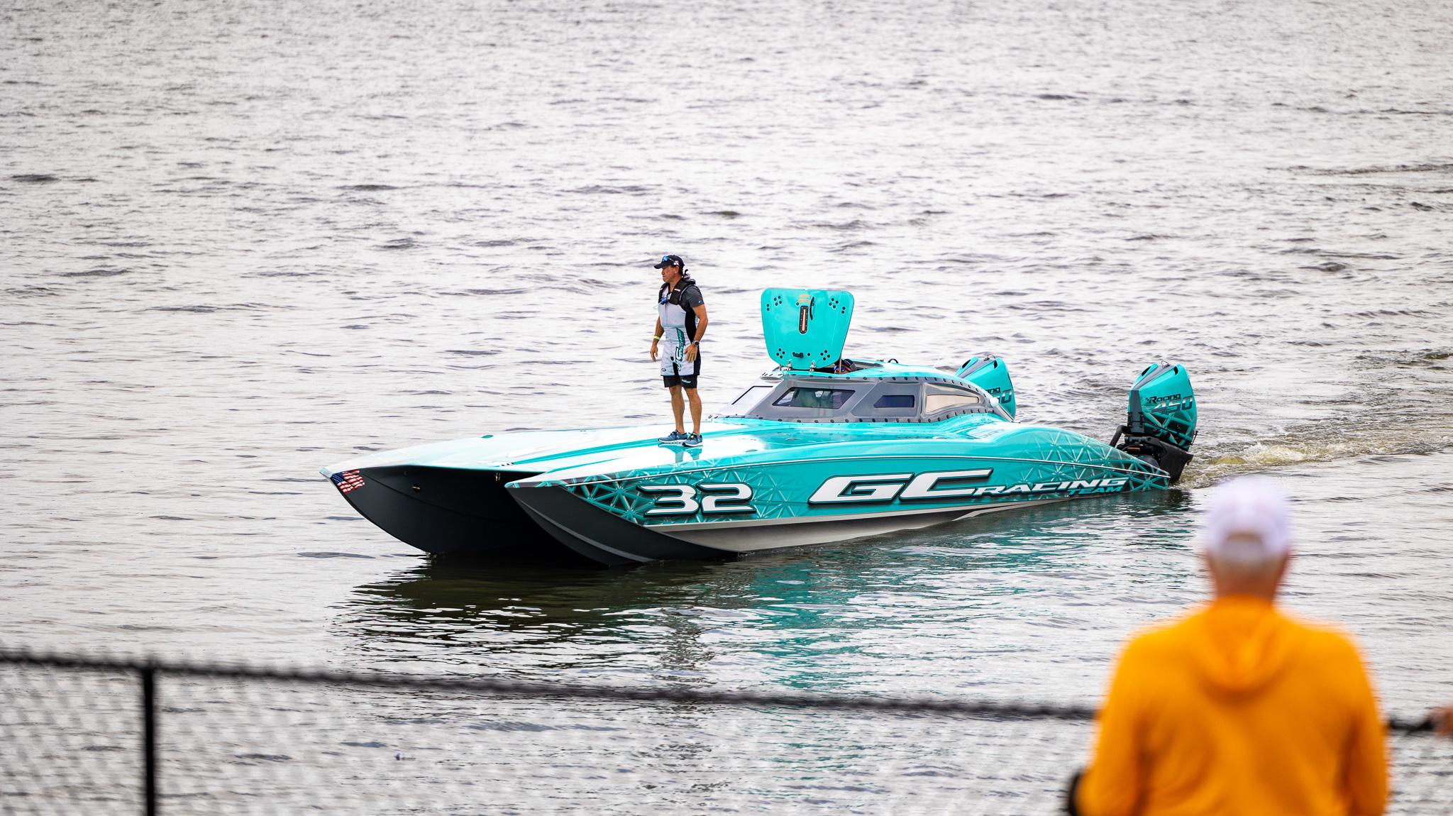 MTI-390XR 2023 -FL-US-2023 MTI 390XR powerboat on water with person standing on deck.-9763954 | Thumbnail