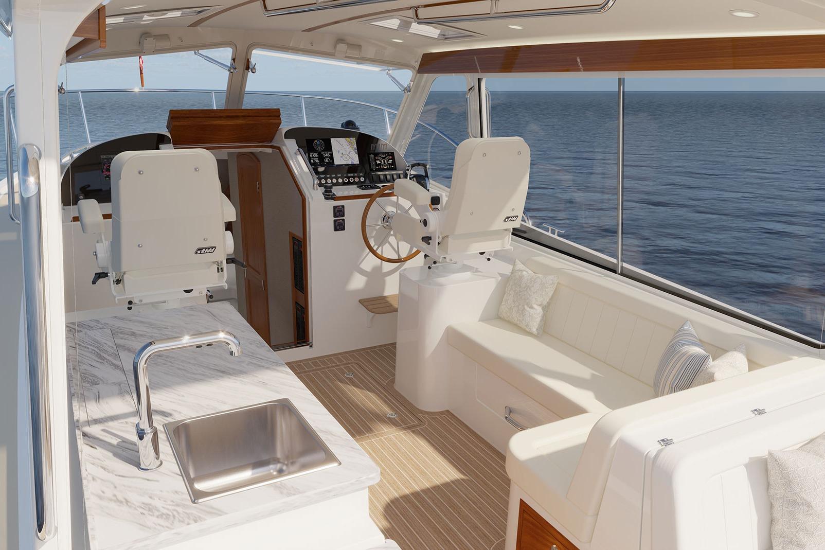 Manufacturer Provided Image: Luxurious 2026 MJM 38R yacht interior with helm, seating, and ocean view.