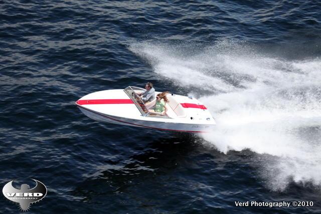 2008 Donzi 18 Classic speedboat cruising on water.