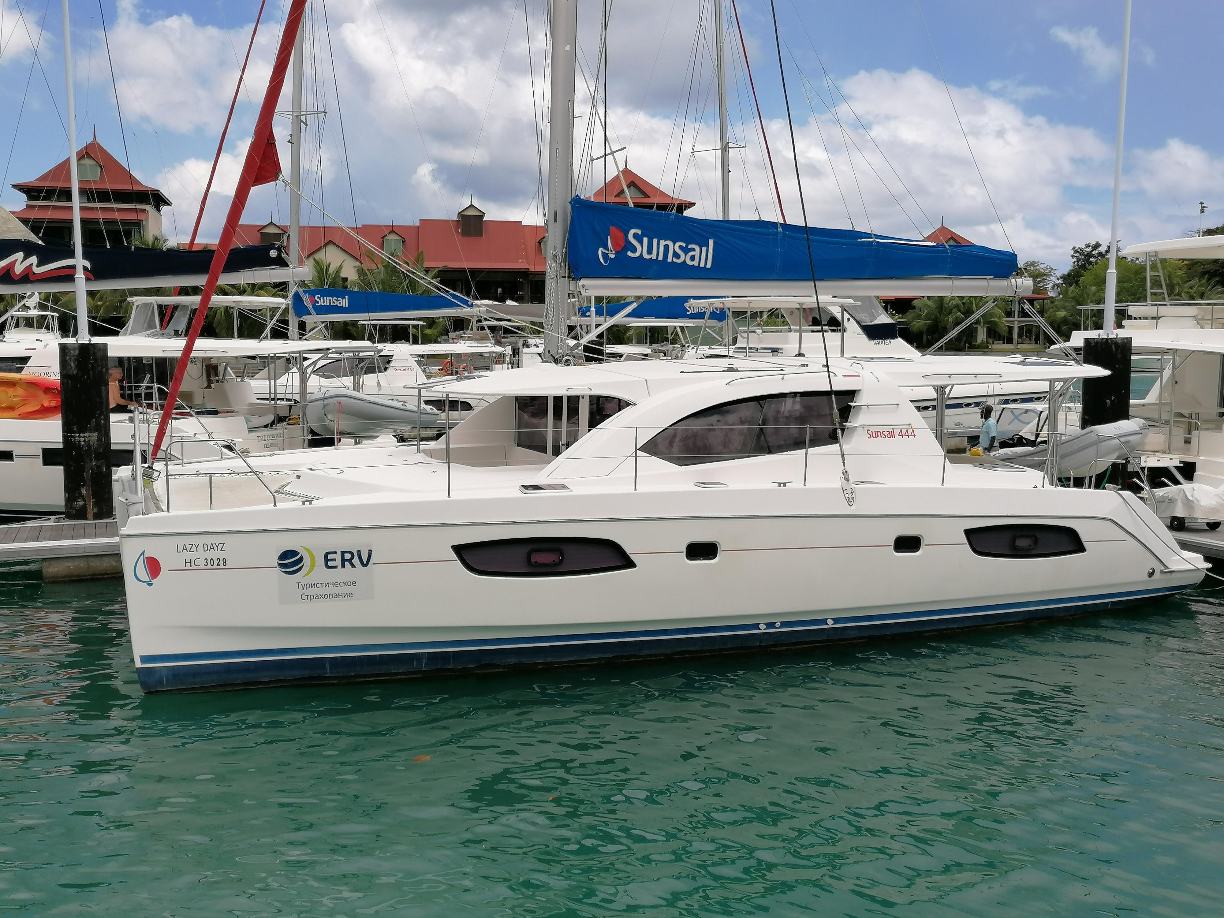 Leopard 44 Sailing Catamaran Lazy Dayz For Sale Leopard Brokerage Winner of cruising world magazine's boat of the year, the sunsail 454 is designed and built to an even higher overall standard and features a full raymarine electronics pack, generator, air conditioning, solar panels, electric primary winches, electric toilets, and more. leopard 44 sailing catamaran lazy dayz