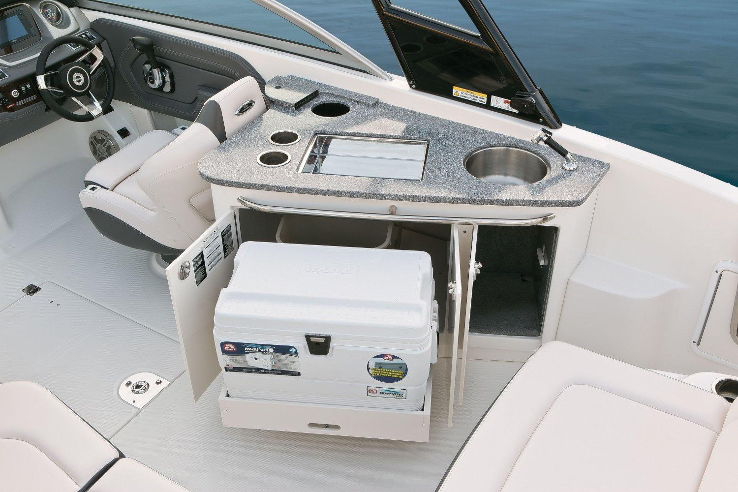 Manufacturer Provided Image: 2016 Chaparral 264 Sunesta boat interior with kitchenette and cooler.