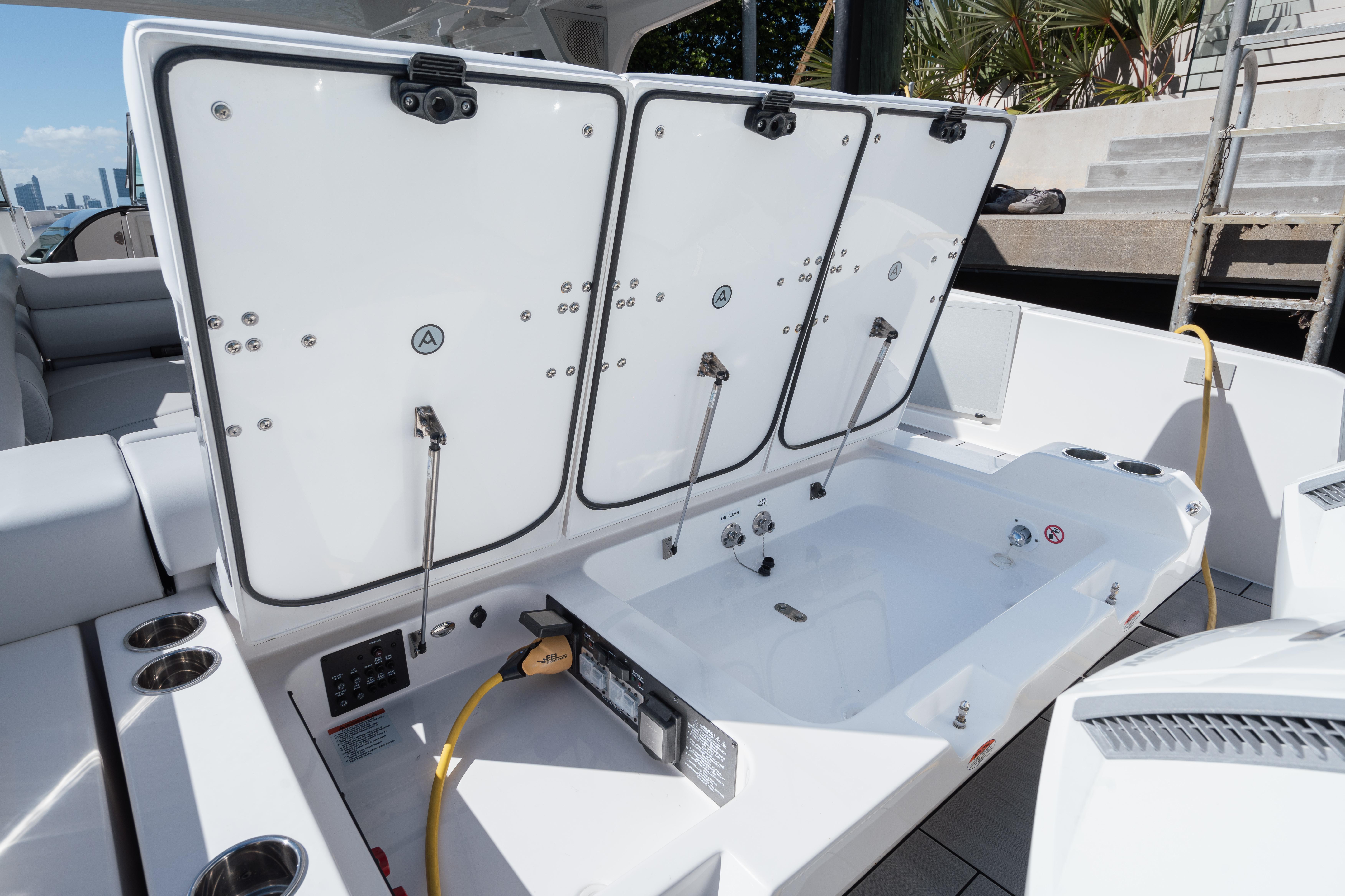 Aviara-AV36 OB 2023-Pellicano FL-US-2023 Aviara AV36 OB boat storage compartments open on deck.-9680430 | Thumbnail