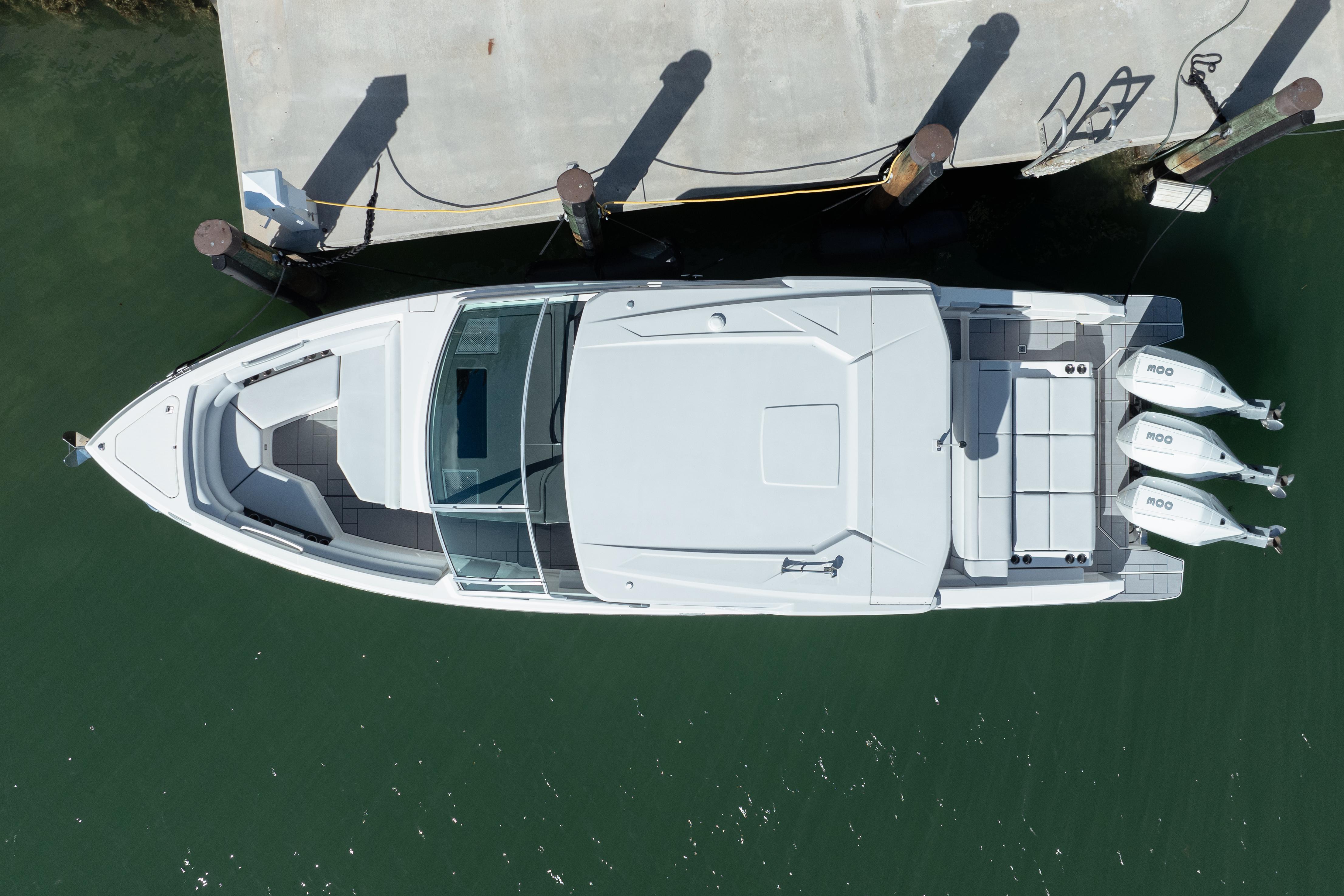Aviara-AV36 OB 2023-Pellicano FL-US-Aerial view of 2023 Aviara AV36 OB boat docked on calm water.-9680430 | Thumbnail