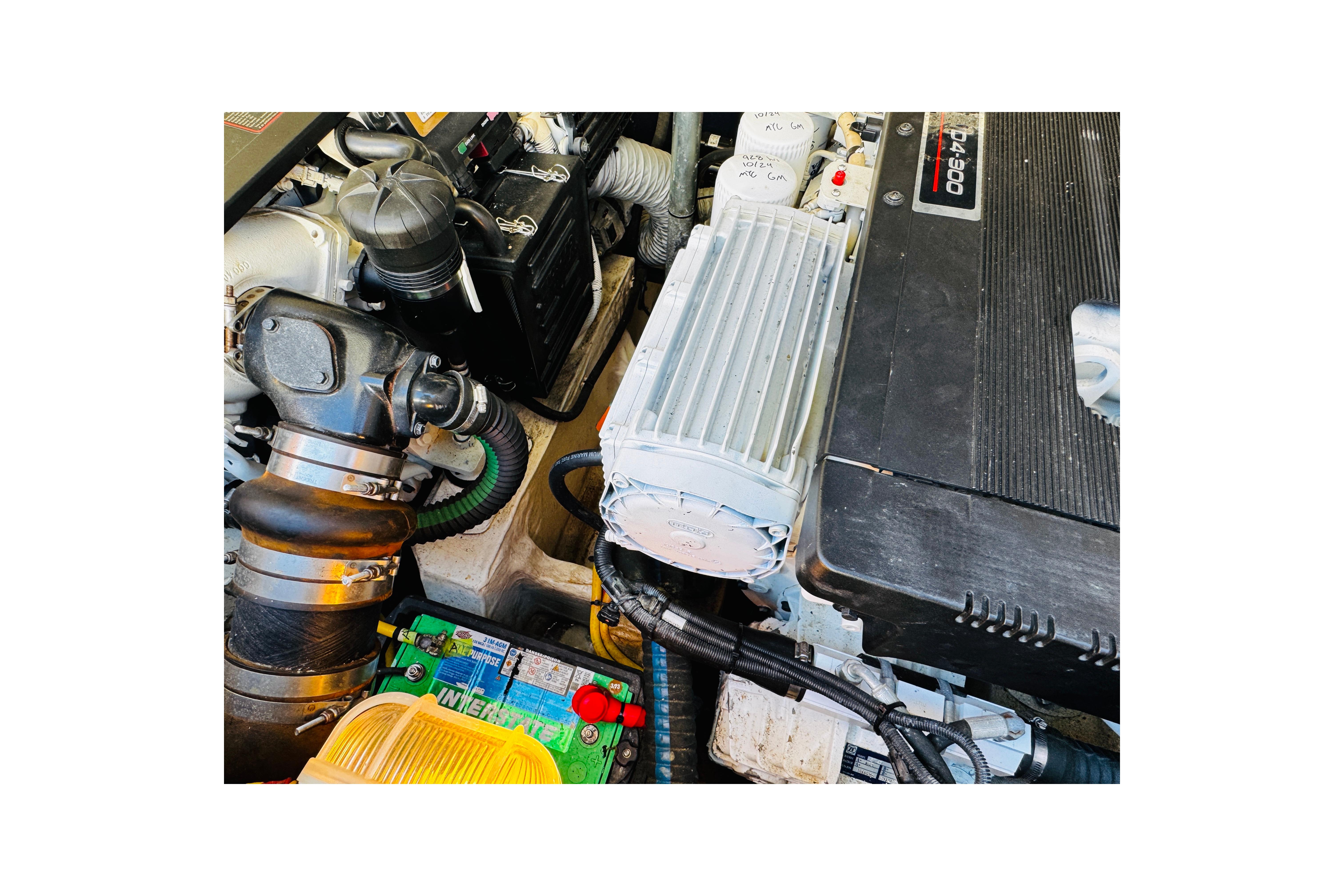 Engine compartment of a 2012 Hinckley Picnic Boat MKIII, showcasing mechanical components.