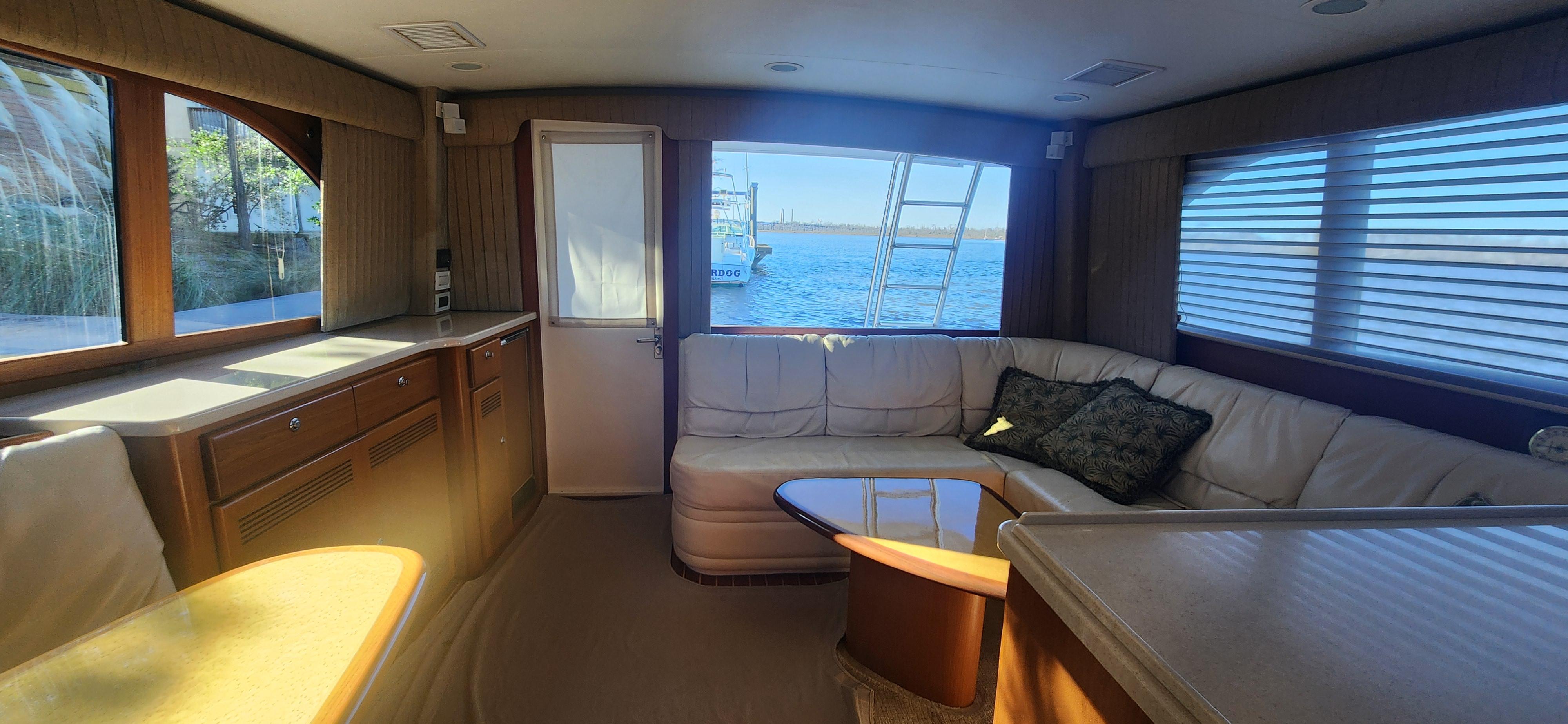 Cabo-48 Convertible 2004-Laura K AL-US-Luxurious interior of 2004 Cabo 48 Convertible yacht with ocean view.-9710440 | Thumbnail