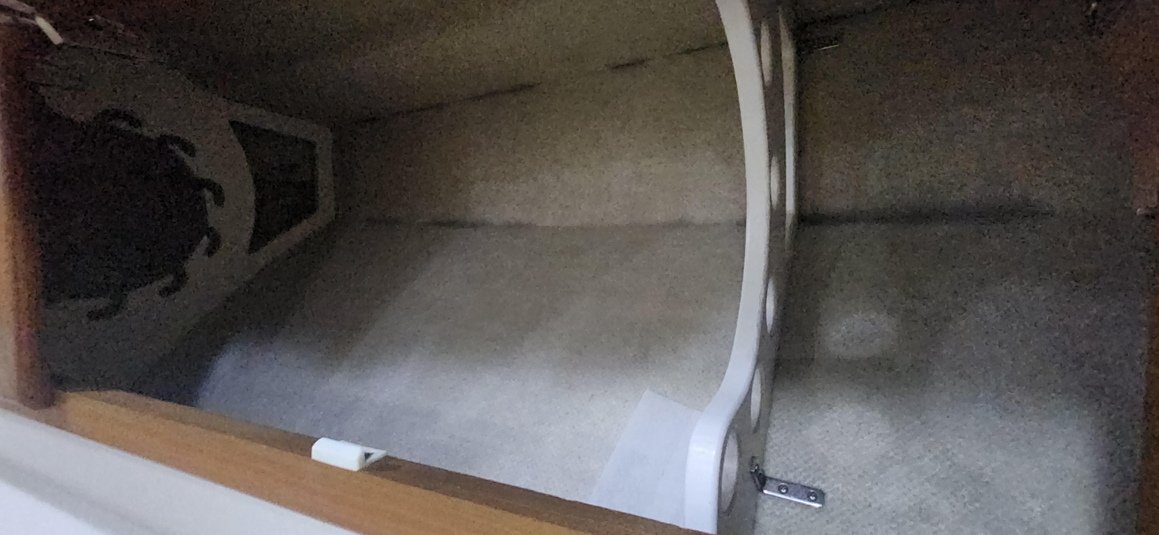 Cabo-48 Convertible 2004-Laura K AL-US-Interior storage space of a 2004 Cabo 48 Convertible boat.-9710440 | Thumbnail