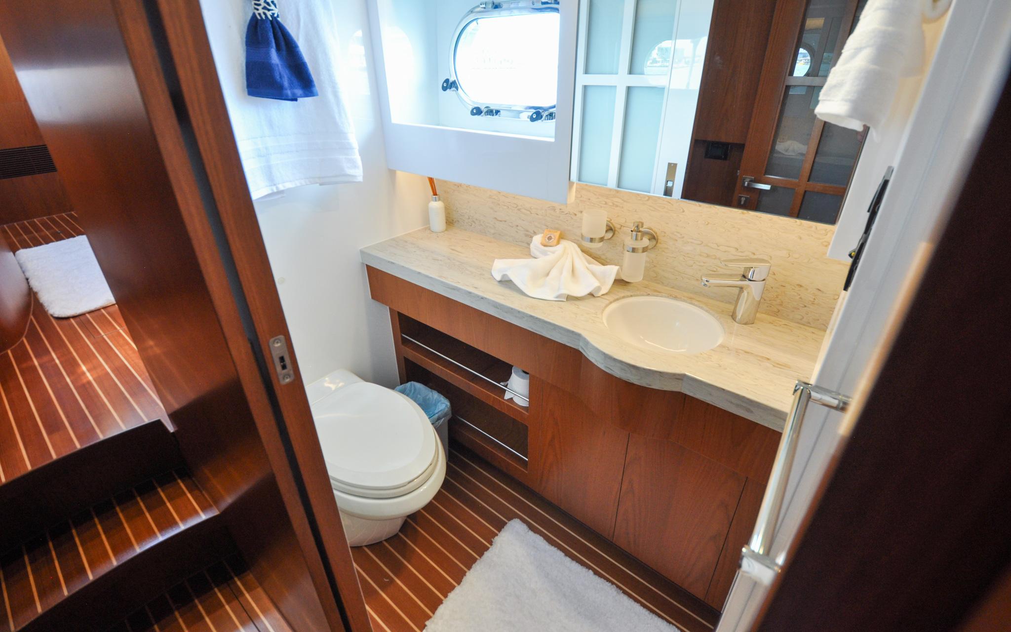 Castina Yacht Photos Pics Horizon 65PC - Castina - Starboard Hull - Forward Guest Cabin - Head