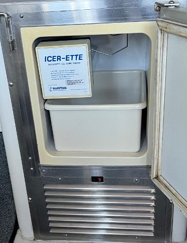 Built-in ice maker on a 1997 Carver 350 Mariner boat.