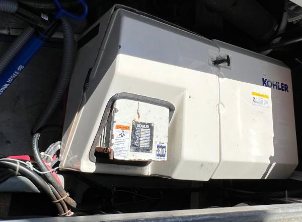 Kohler generator in a 1997 Carver 350 Mariner boat engine compartment.