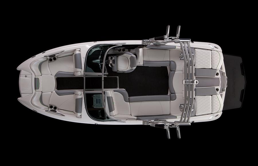 2013 MasterCraft X-25 boat interior, top view, showcasing seating and layout on black background.