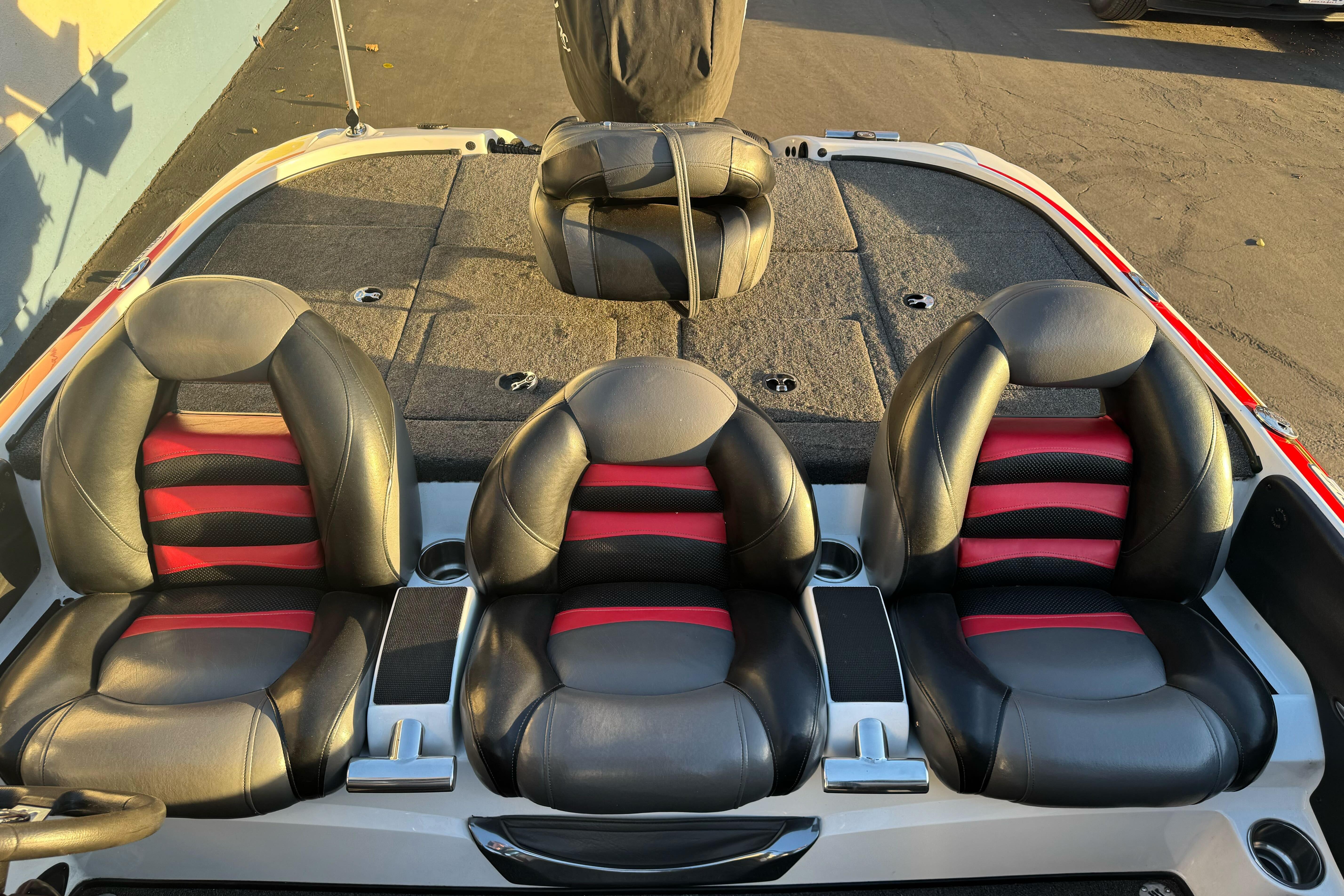 2011 Nitro Z-9 DC boat interior with black and red seats, spacious layout.