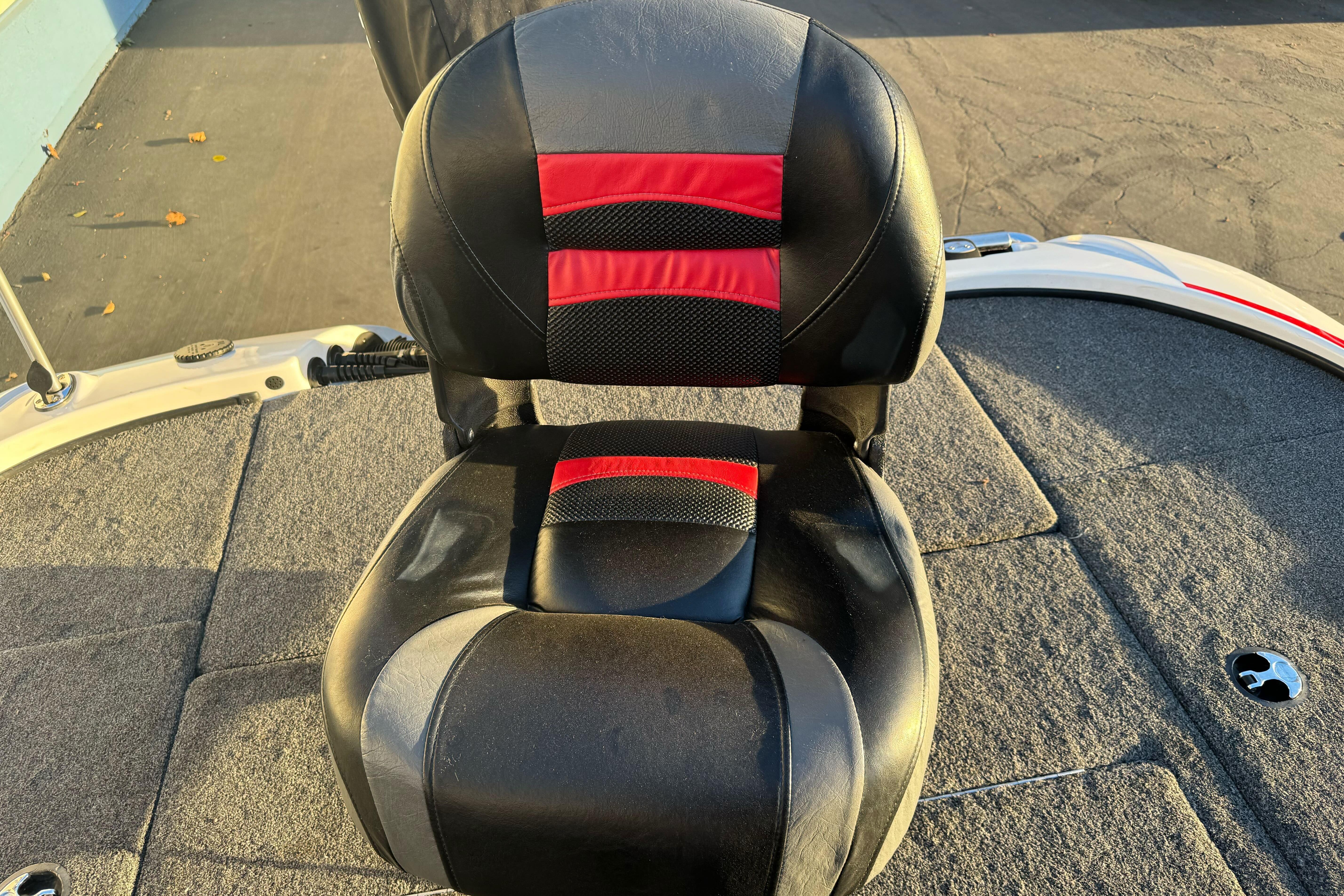Black and red seat on 2011 Nitro Z-9 DC boat deck.