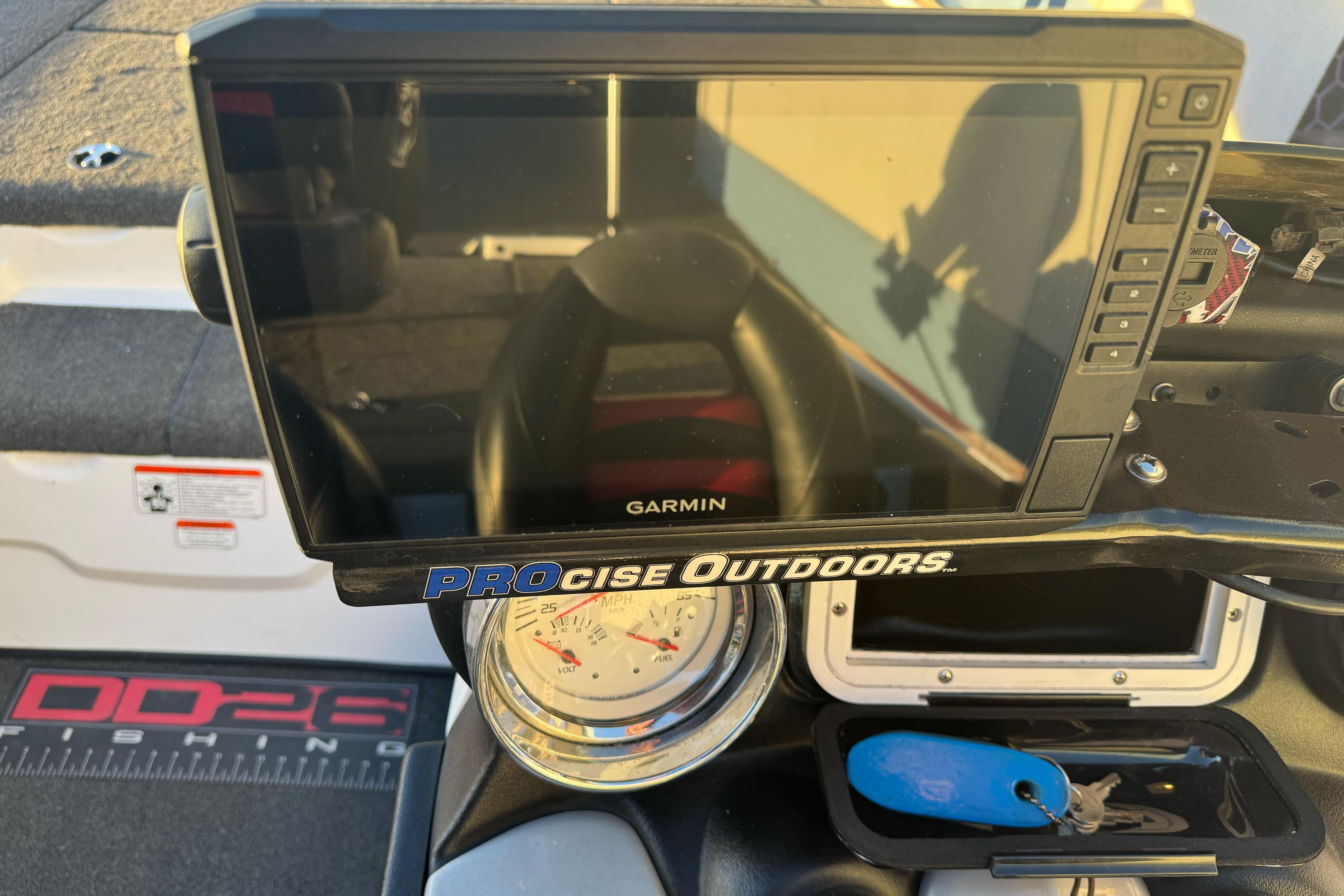 Dashboard of a 2011 Nitro Z-9 DC boat with Garmin display and speedometer.