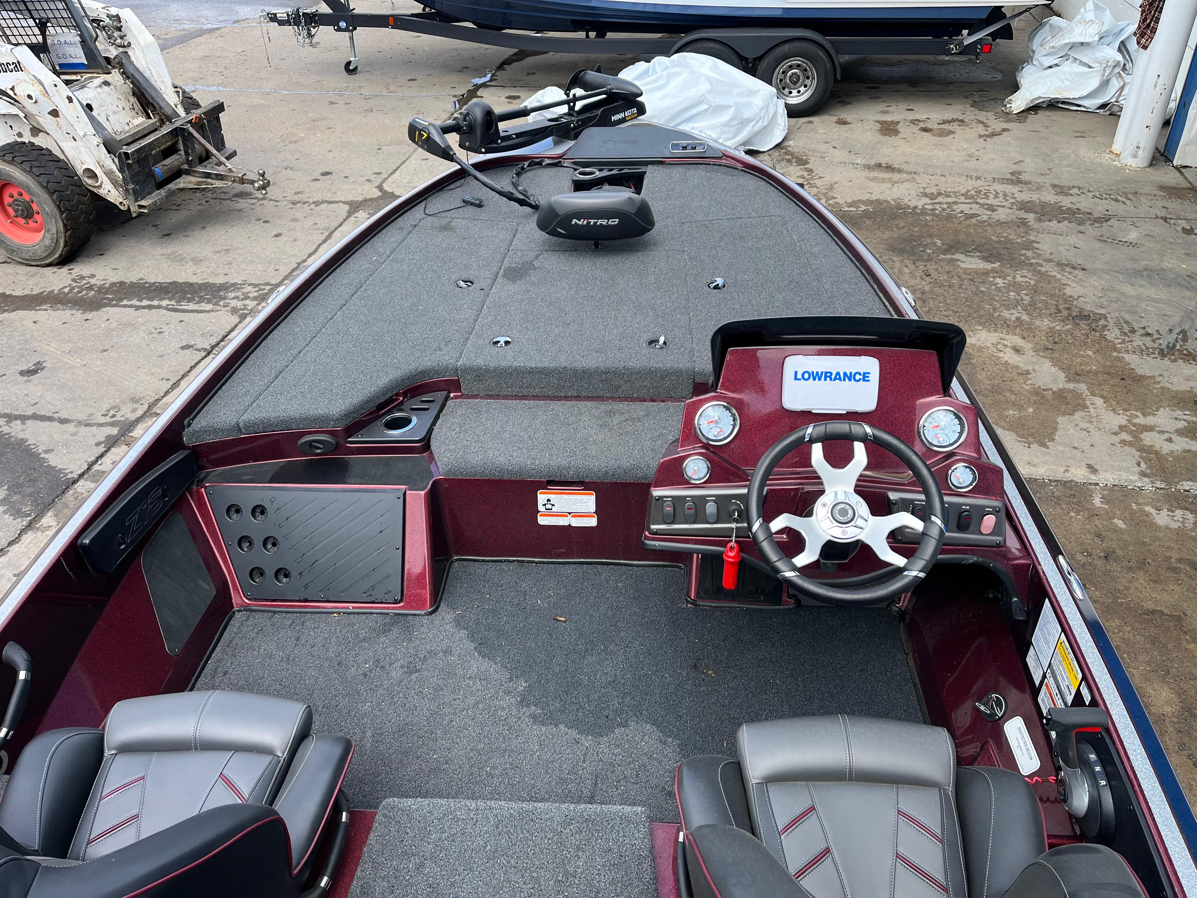 2022 Nitro Z18 boat interior with steering wheel and Lowrance electronics.