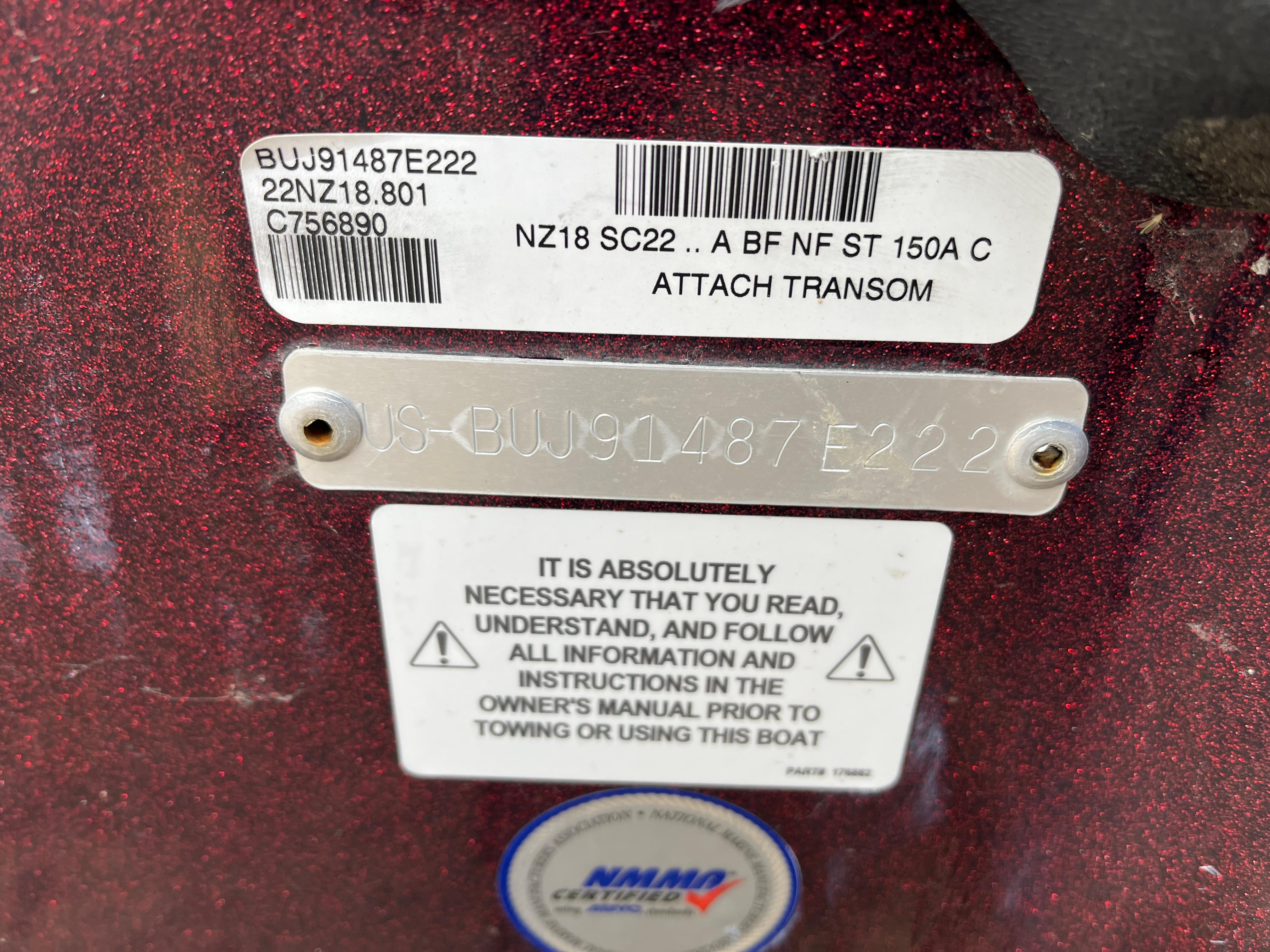 Boat identification labels on a 2022 Nitro Z18, featuring model and safety instructions.