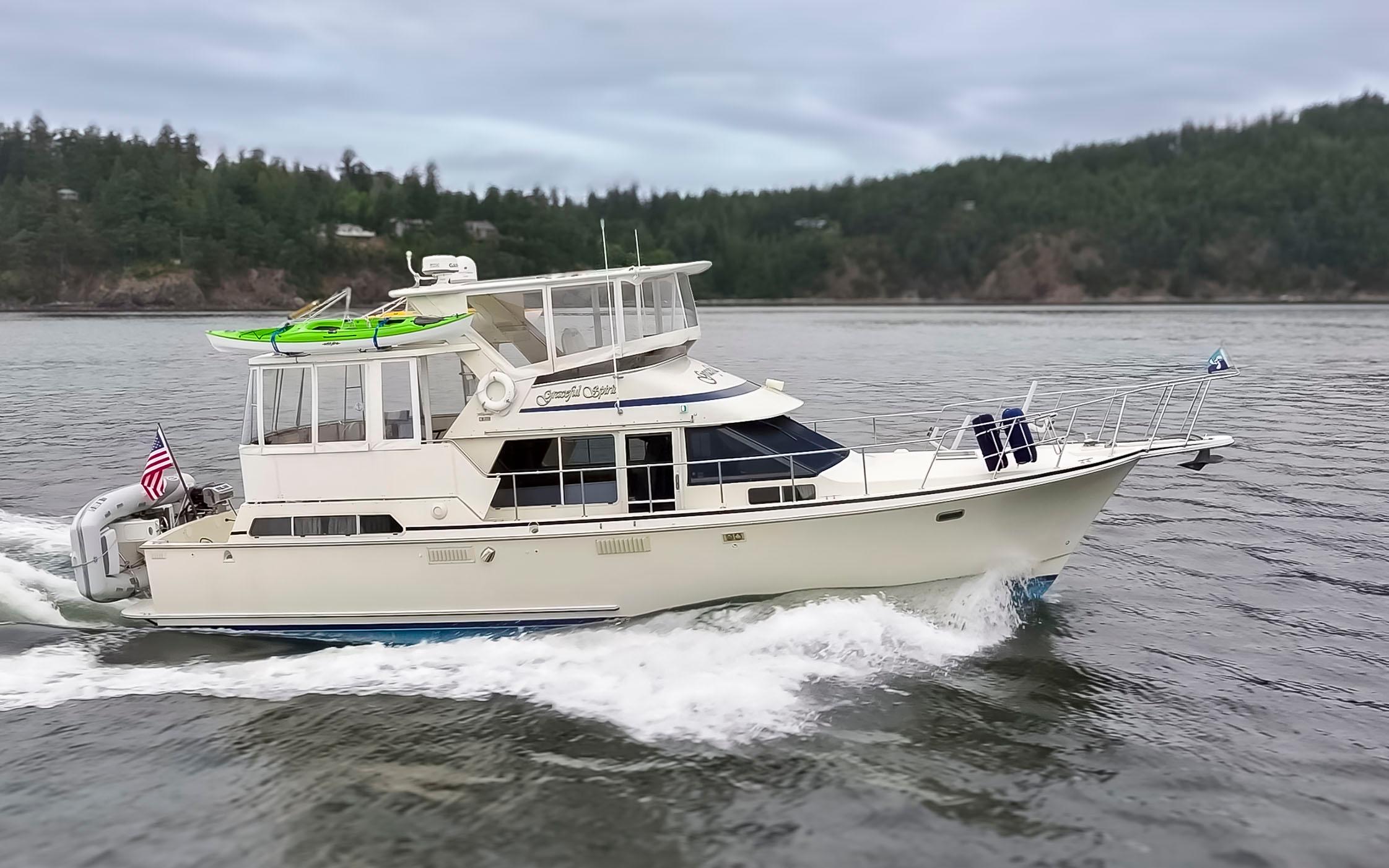 Tollycraft-44 Cockpit Motor Yacht 1990-Graceful Spirit WA-US-1990 Tollycraft 44 Cockpit Motor Yacht cruising on a scenic waterway.-9844071 | Thumbnail