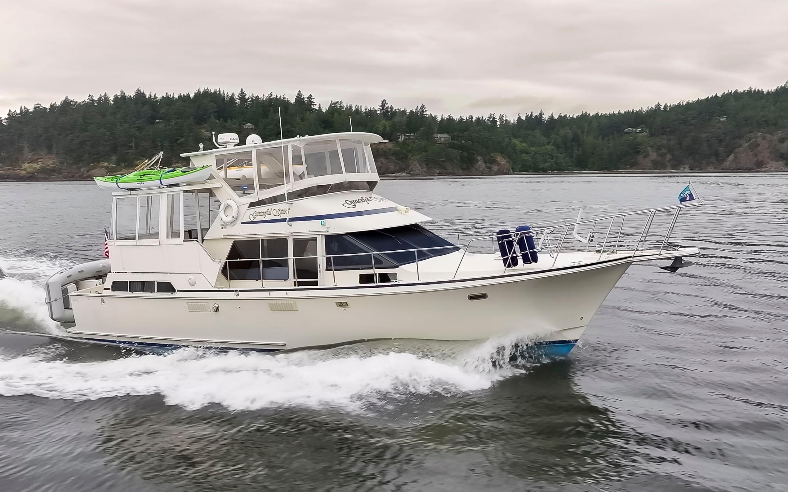 Tollycraft-44 Cockpit Motor Yacht 1990-Graceful Spirit WA-US-1990 Tollycraft 44 Cockpit Motor Yacht cruising on a scenic waterway.-9844071 | Thumbnail