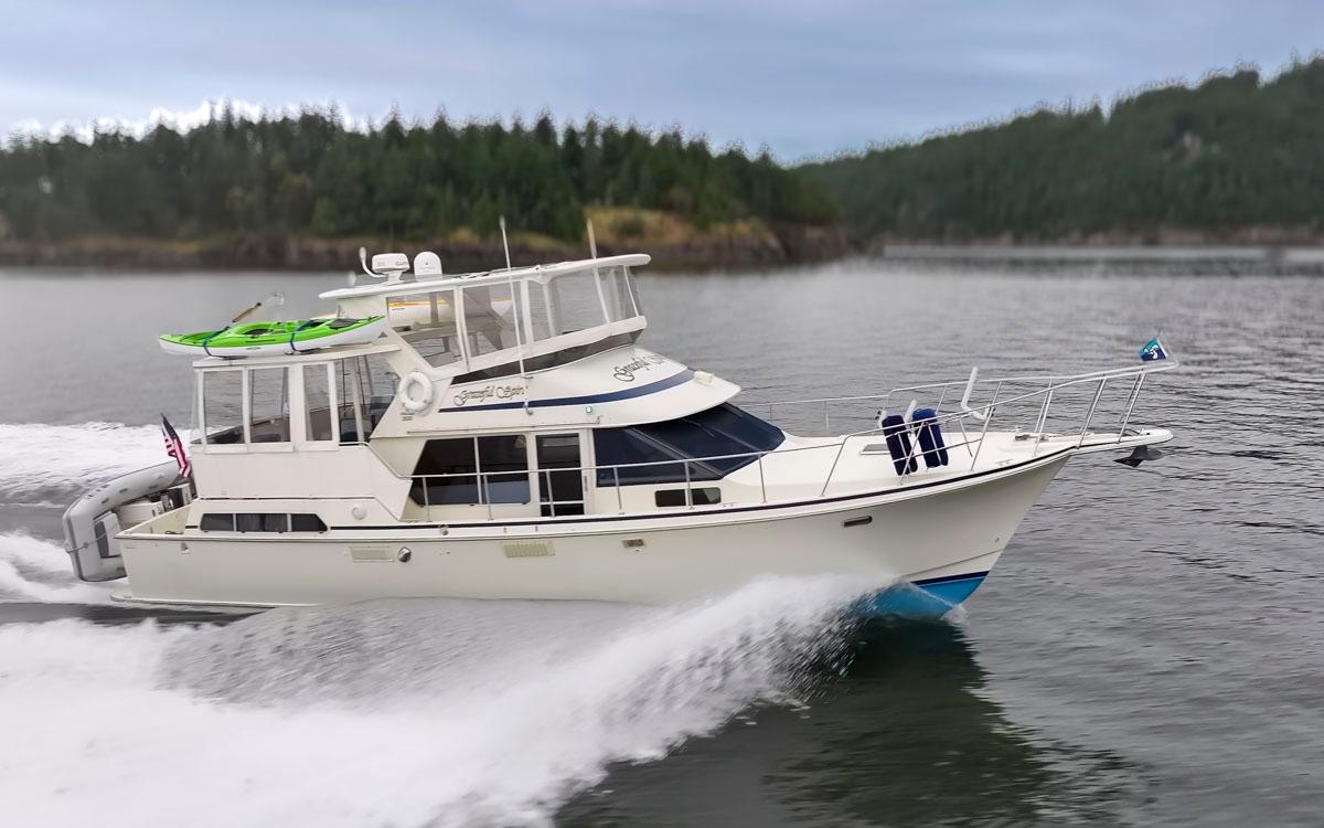 Tollycraft-44 Cockpit Motor Yacht 1990-Graceful Spirit WA-US-1990 Tollycraft 44 Cockpit Motor Yacht cruising on a scenic waterway.-9844071 | Thumbnail