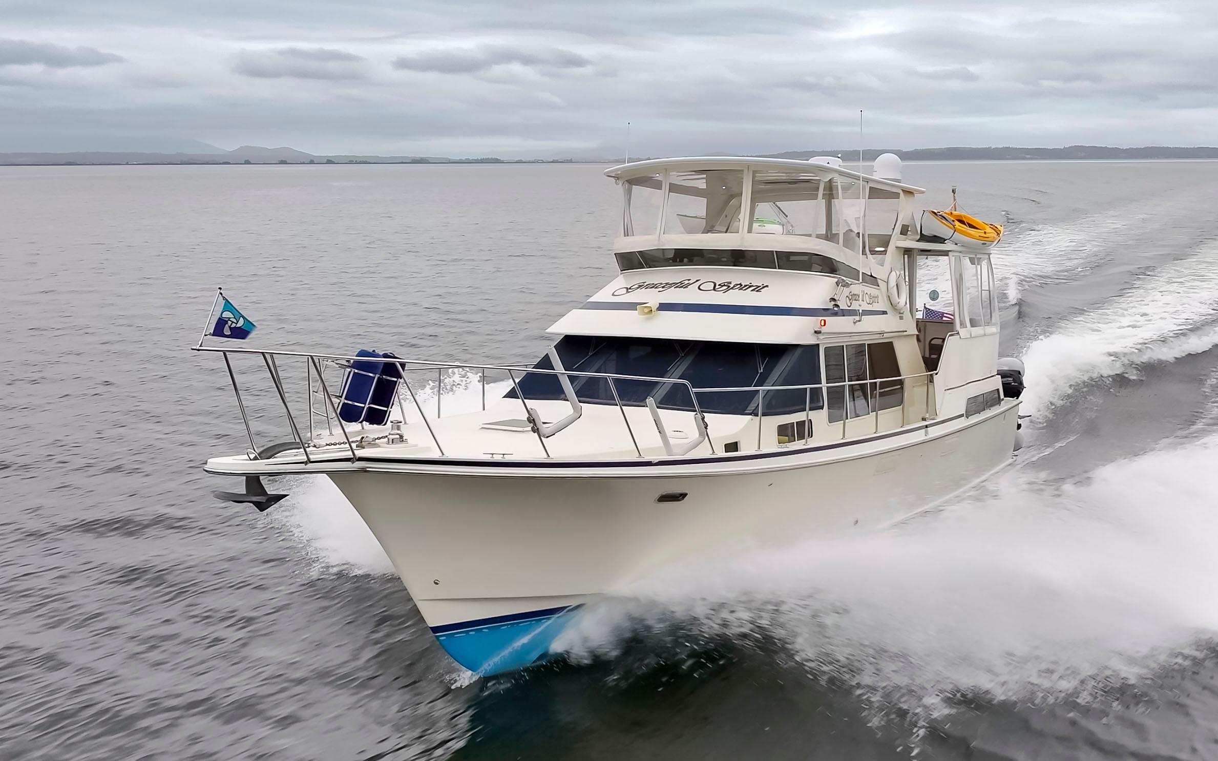 Tollycraft-44 Cockpit Motor Yacht 1990-Graceful Spirit WA-US-1990 Tollycraft 44 Cockpit Motor Yacht cruising on open water.-9844071