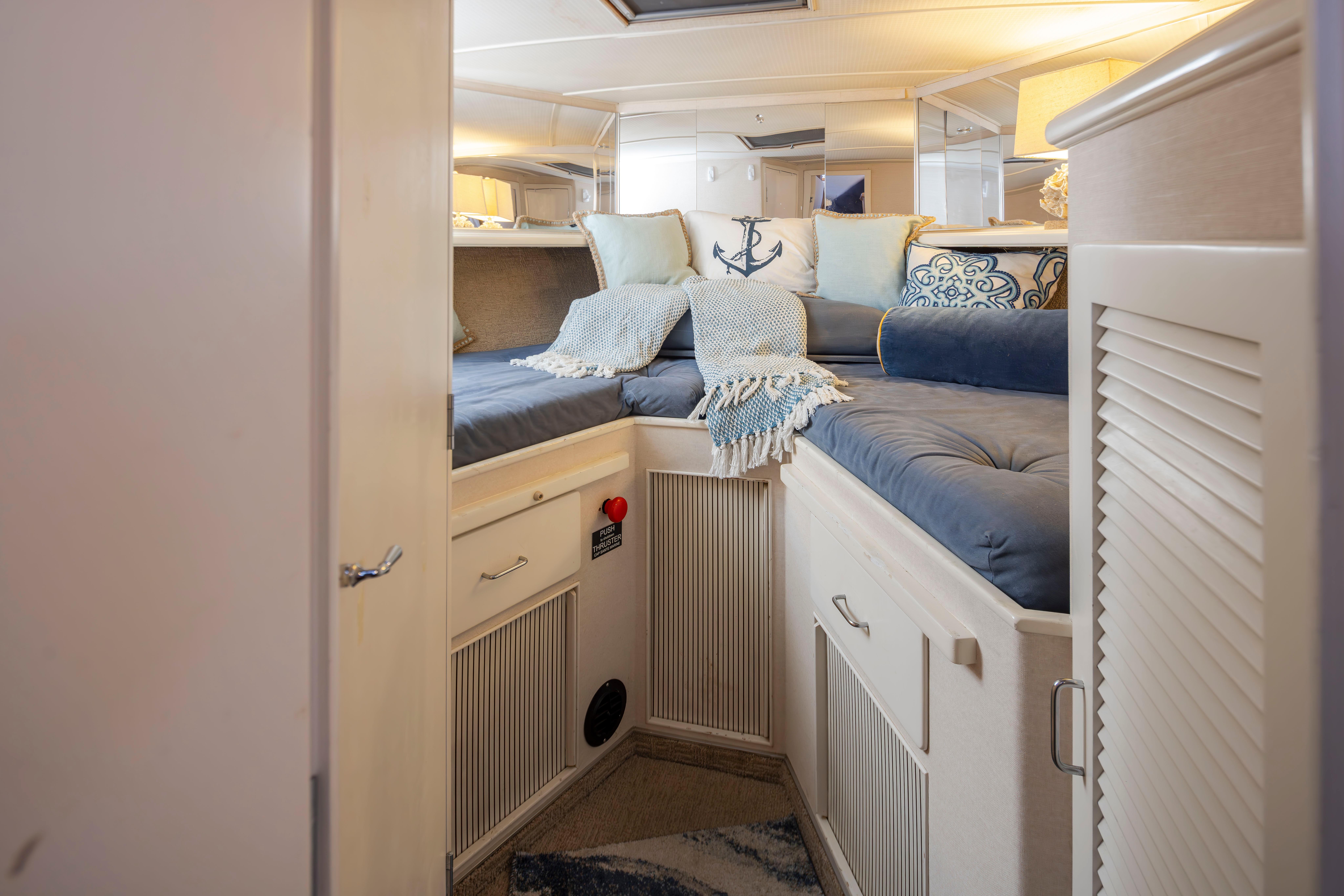 Tollycraft-44 Cockpit Motor Yacht 1990-Graceful Spirit WA-US-Interior of 1990 Tollycraft 44 Cockpit Motor Yacht with cozy bedding and nautical decor.-9844071 | Thumbnail