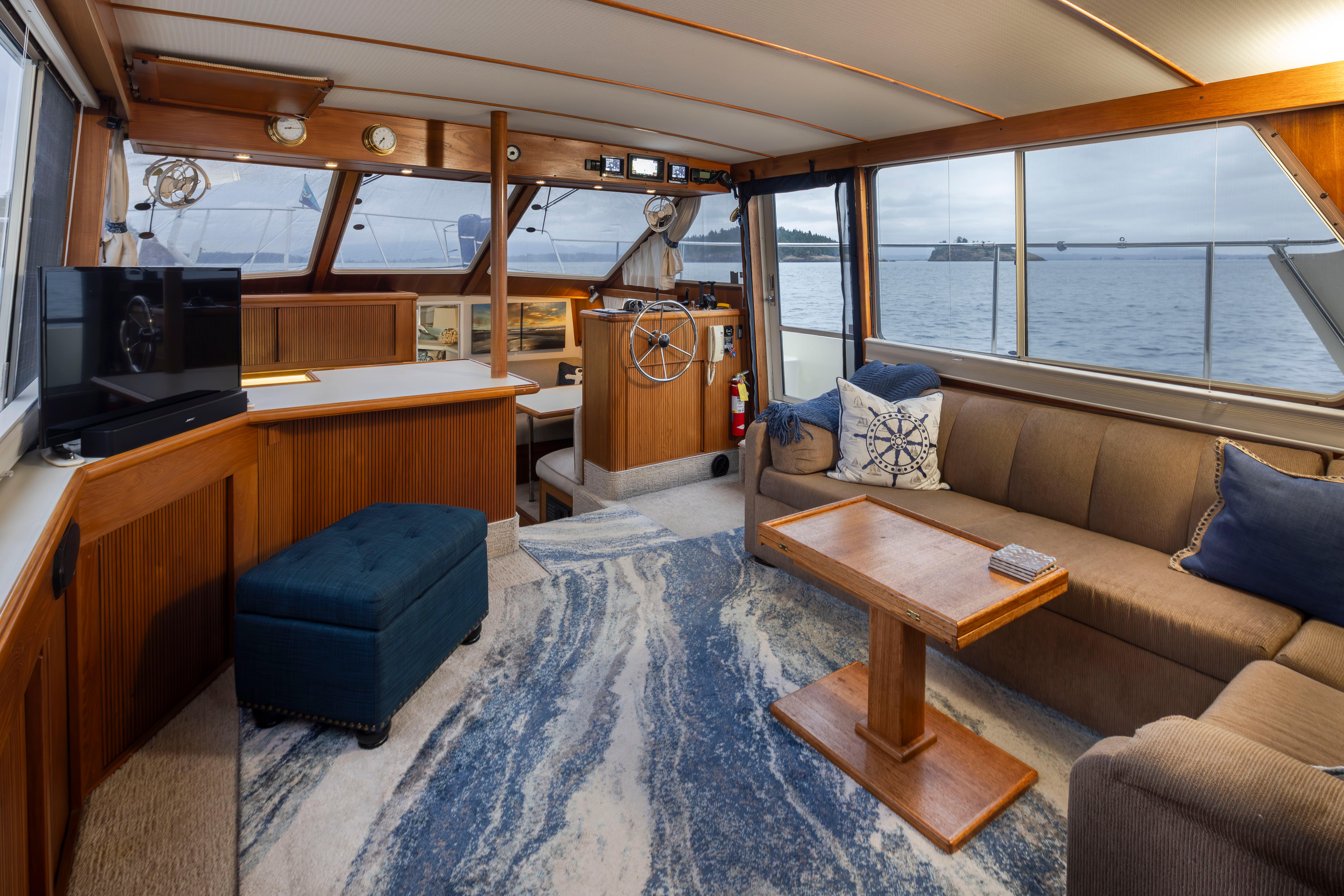 Tollycraft-44 Cockpit Motor Yacht 1990-Graceful Spirit WA-US-Luxurious interior of a 1990 Tollycraft 44 Cockpit Motor Yacht with elegant seating and ocean view.-9844071 | Thumbnail