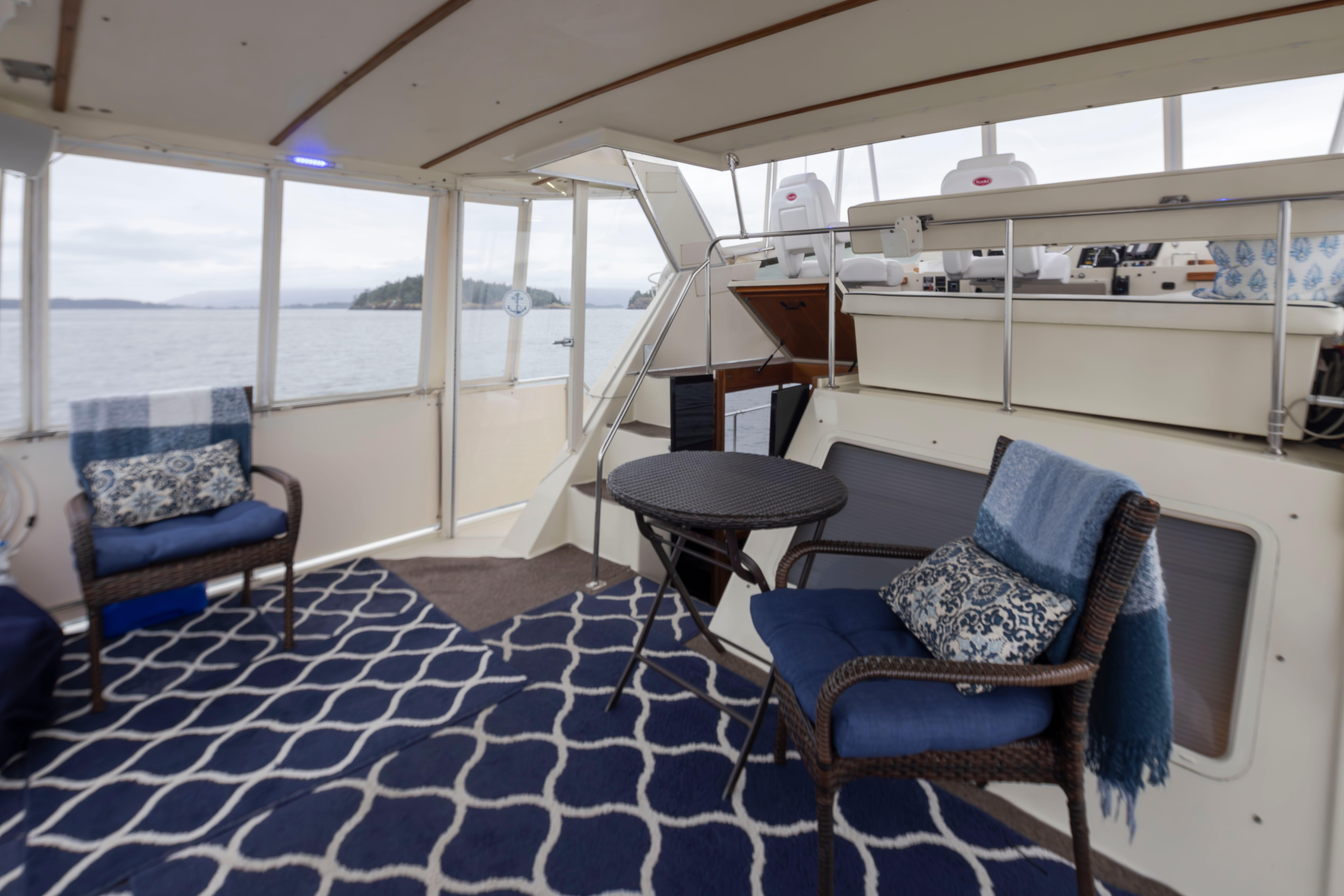 Tollycraft-44 Cockpit Motor Yacht 1990-Graceful Spirit WA-US-1990 Tollycraft 44 Cockpit Motor Yacht interior with seating, table, and ocean view.-9844071 | Thumbnail
