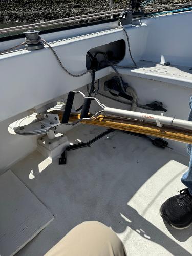 1982 Greene Marine 35 Acapella boat interior with steering mechanism and seating area.