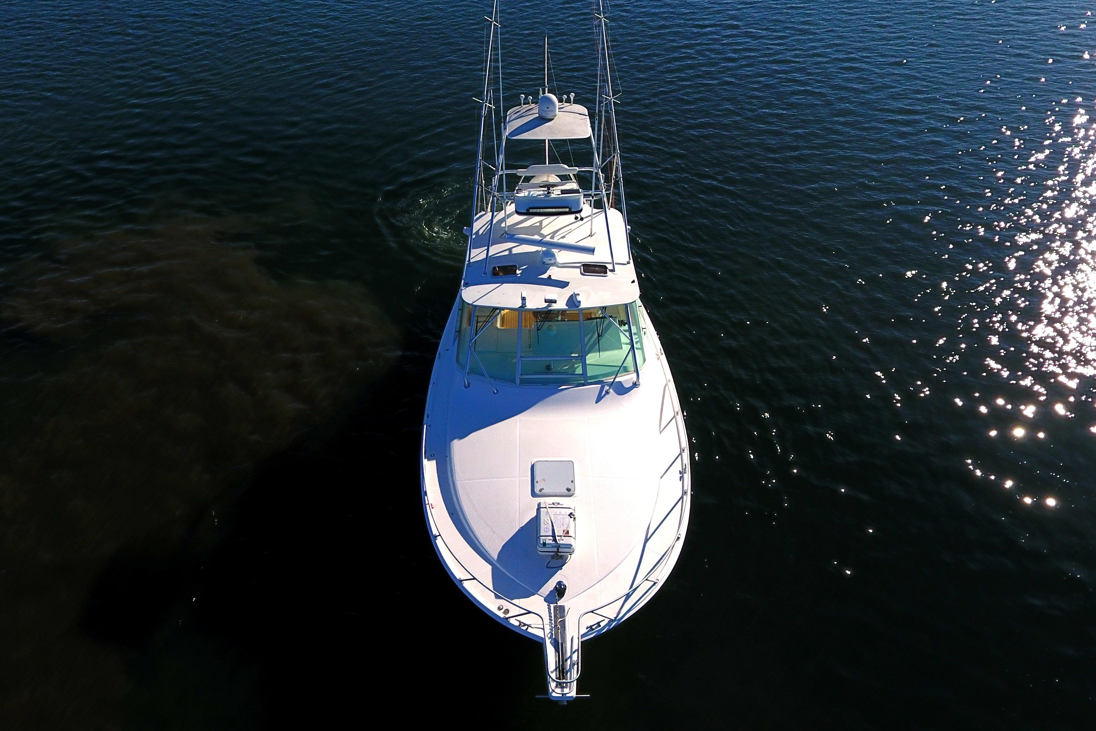 Cabo-Express 2004-TUNA DAZE MA-US-Aerial view of 2004 Cabo Express boat on calm water.-5384122 | Thumbnail