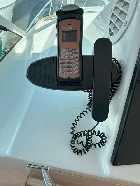 Cabo-Express 2004-TUNA DAZE MA-US-Satellite phone mounted on a 2004 Cabo Express boat dashboard.-5384122 | Thumbnail
