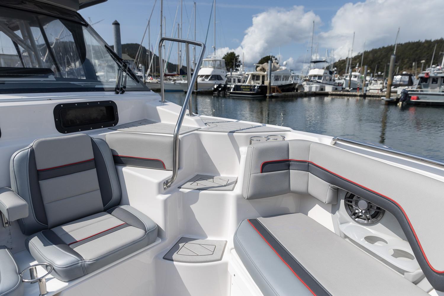 Solara-S-310 CW 2025 -FL-US-2025 Solara S-310 CW boat interior with modern seating at a marina.-9624144 | Thumbnail