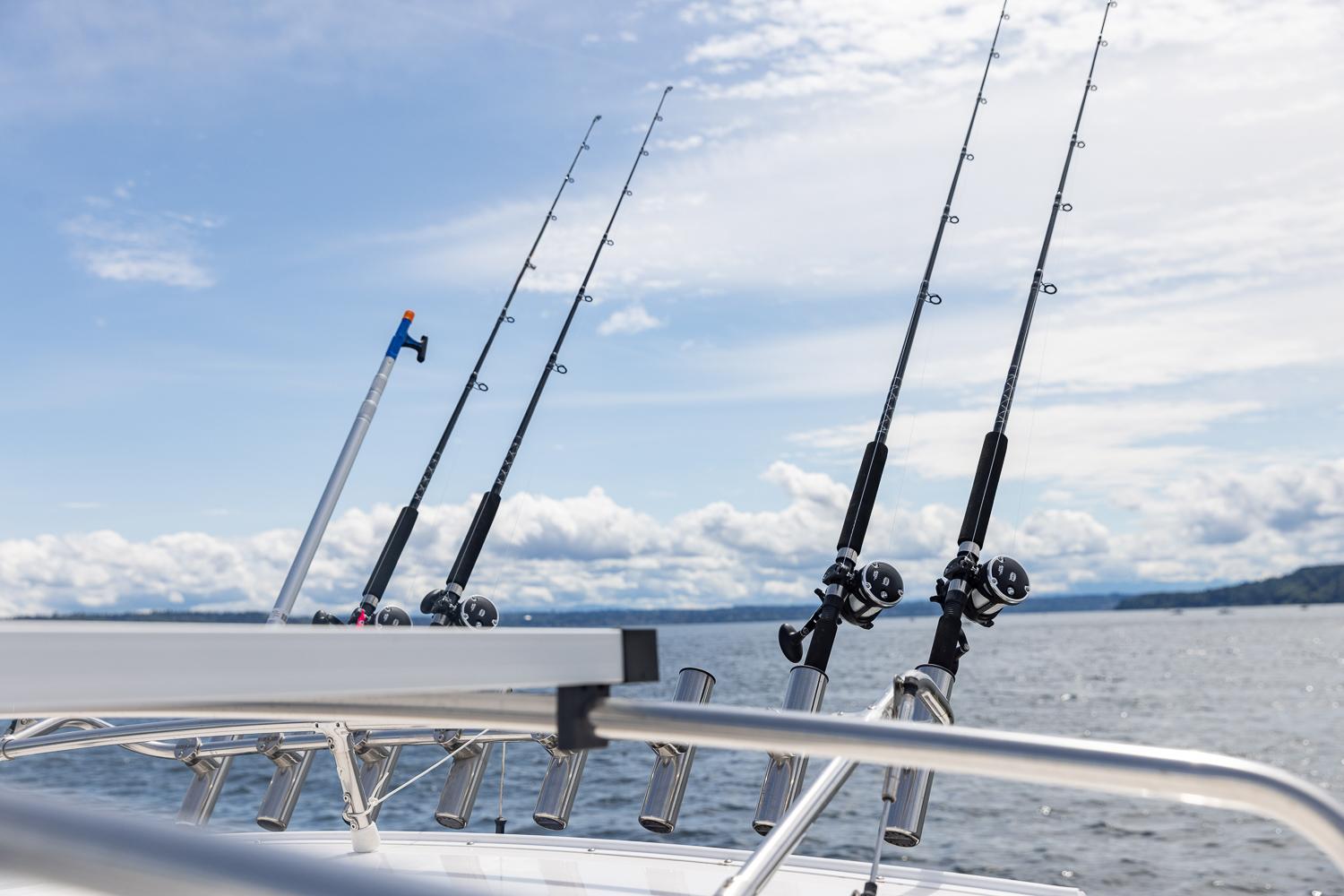 Solara-S-310 CW 2025 -FL-US-Fishing rods on a 2025 Solara S-310 CW boat under a clear sky.-9624144 | Thumbnail