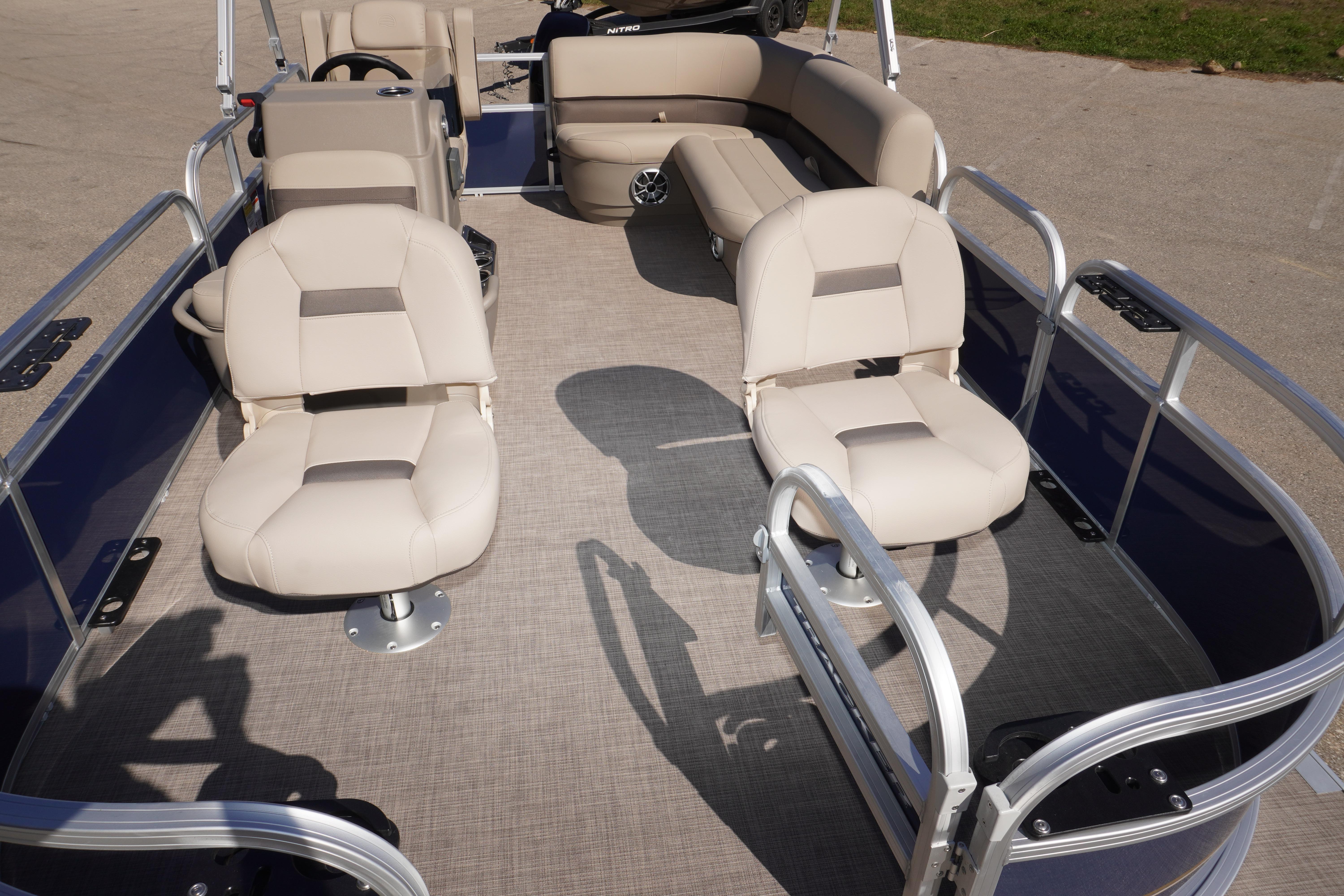 2025 Sun Tracker Bass Buggy 16 XL Select pontoon boat interior with beige seating.