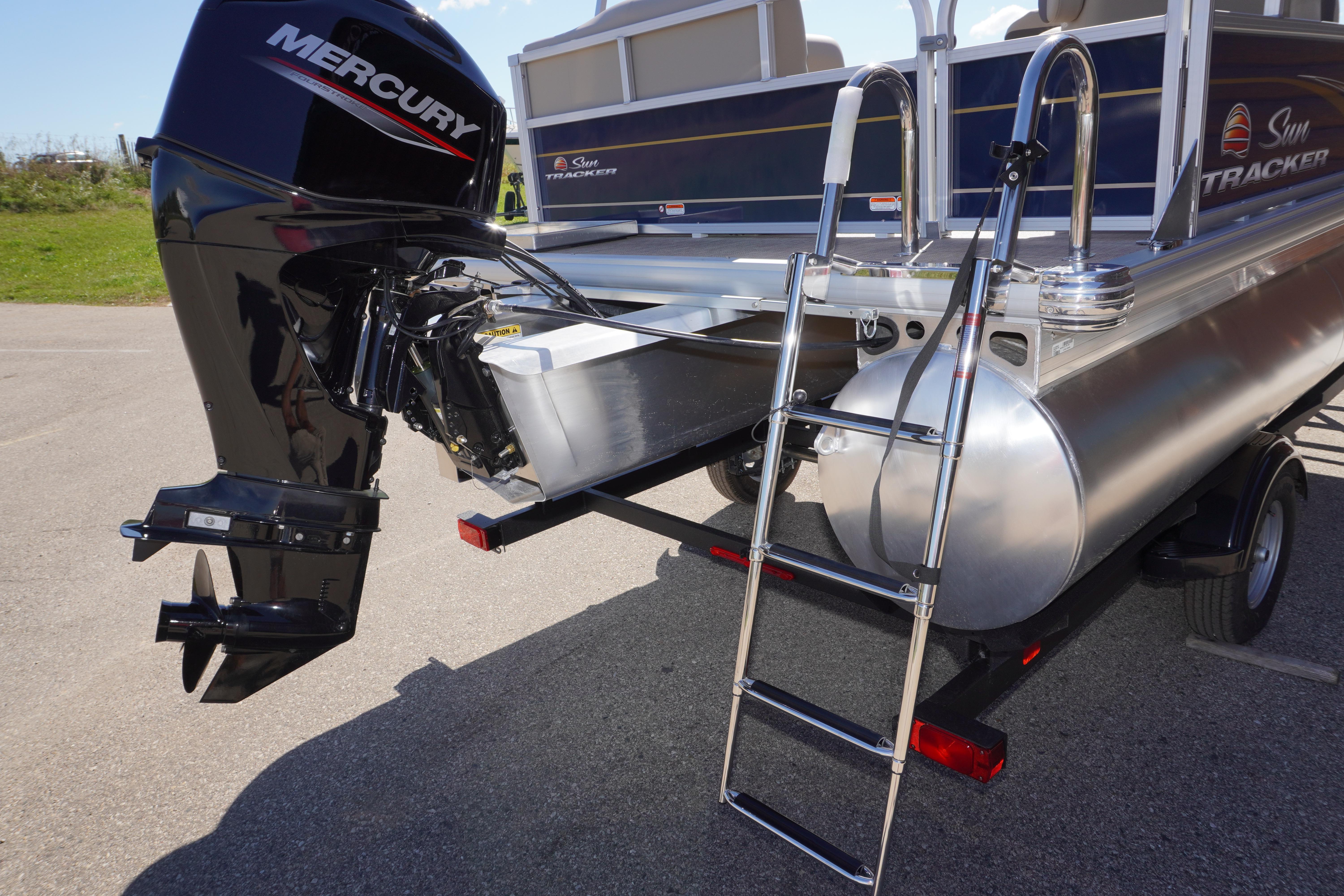 2025 Sun Tracker Bass Buggy 16 XL Select with Mercury outboard motor and ladder.