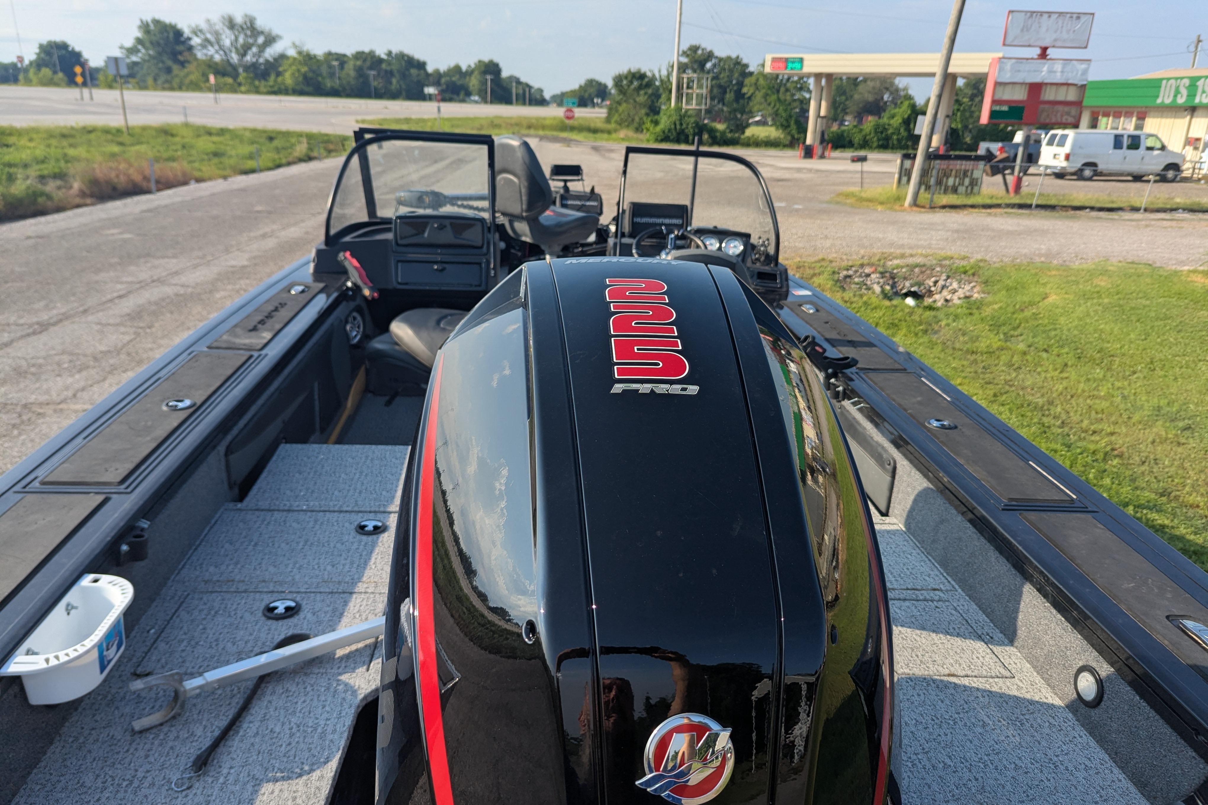 2023 Tracker Targa V-19 Combo Tournament Edition boat with powerful engine, parked outdoors.