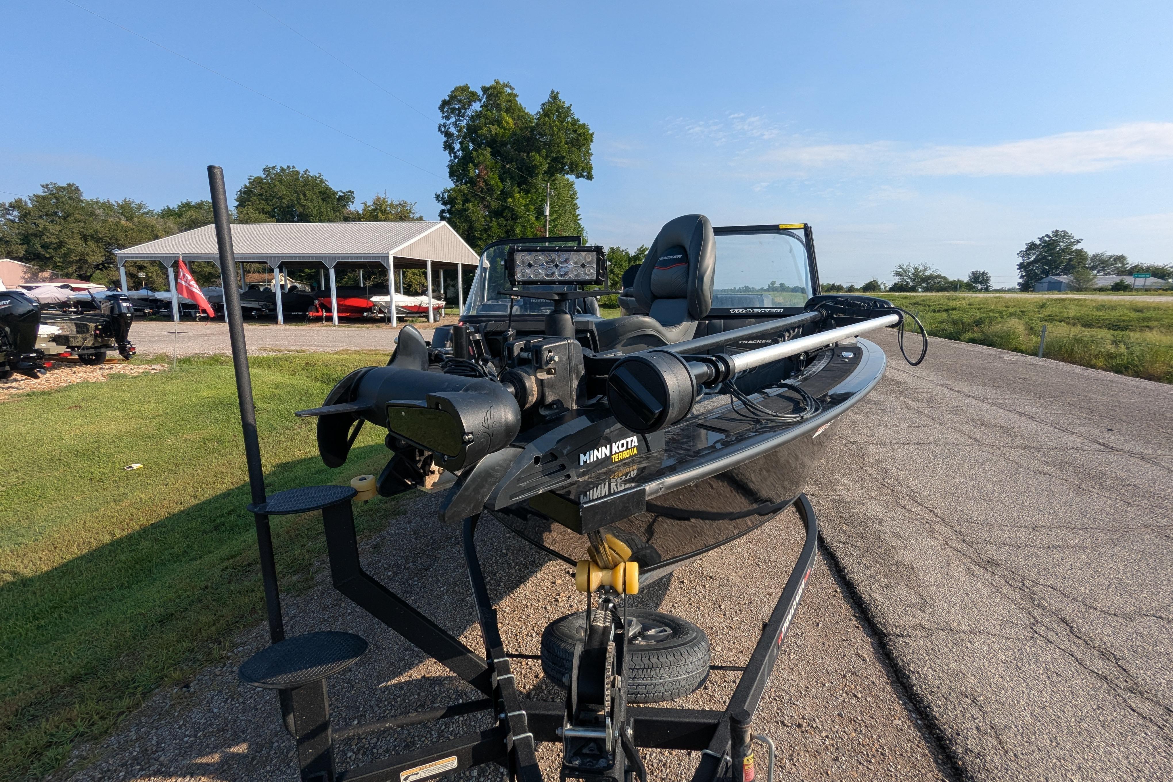 2023 Tracker Targa V-19 Combo Tournament Edition boat on trailer, outdoor setting.