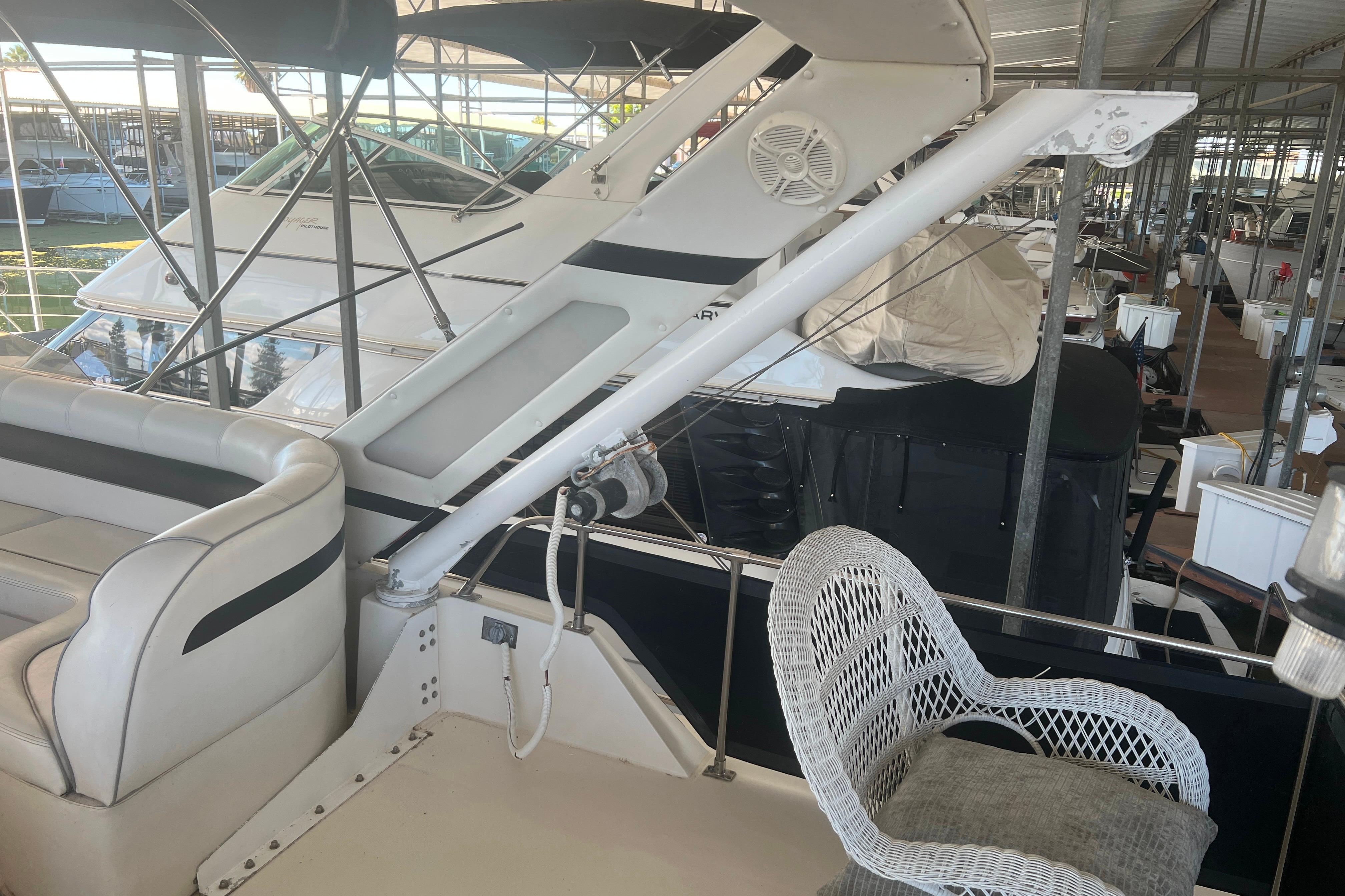 1986 Bayliner 4550 Motoryacht Flybridge showing dinghy davit with reinforced base