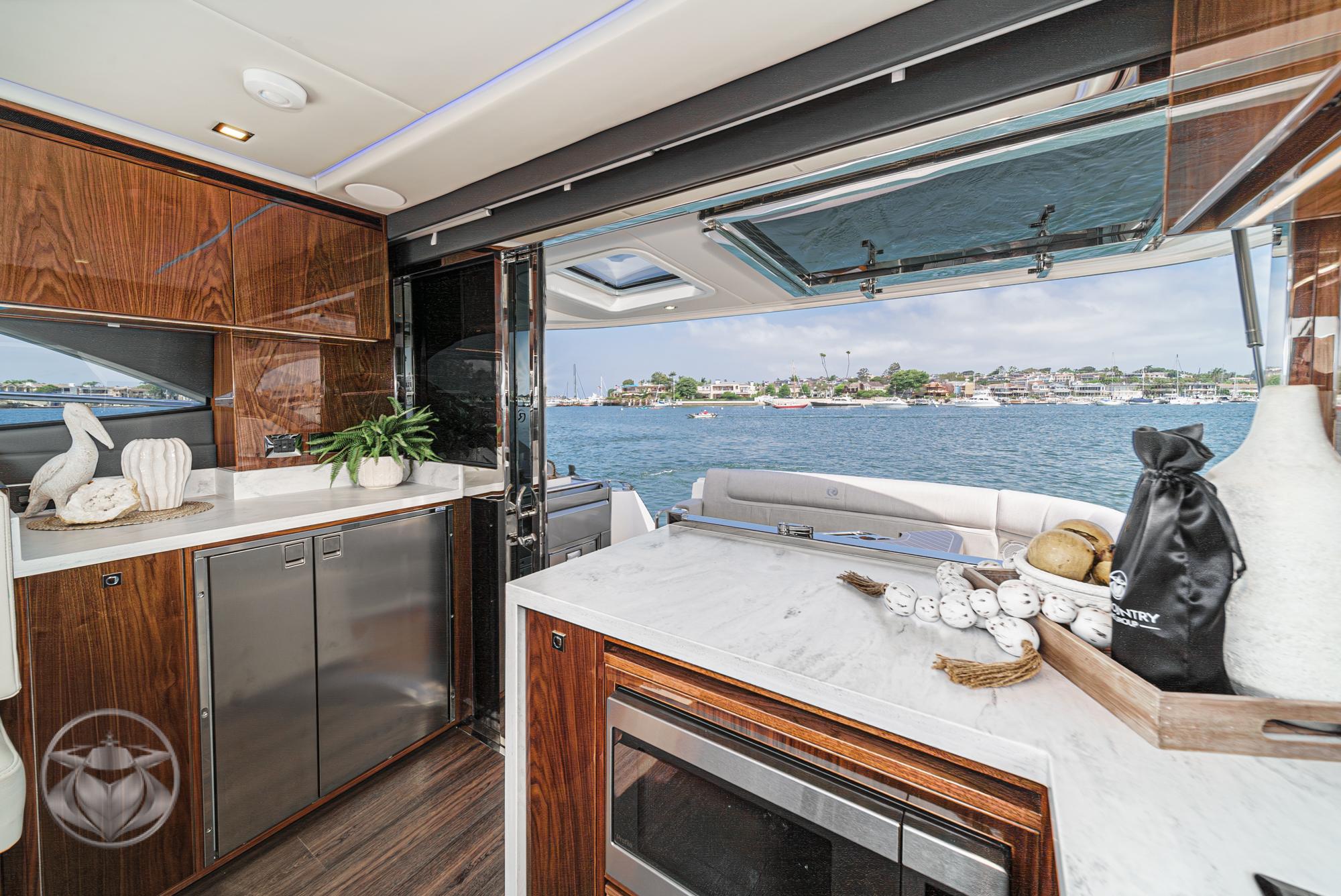 2025 Riviera 4600 Sport Yacht #R056-25 inventory image at Sun Country Marine Group, Newport Beach 2025 Riviera 4600 Sport Yacht #R056-25 inventory image at Sun Country Marine Group, Newport Beach