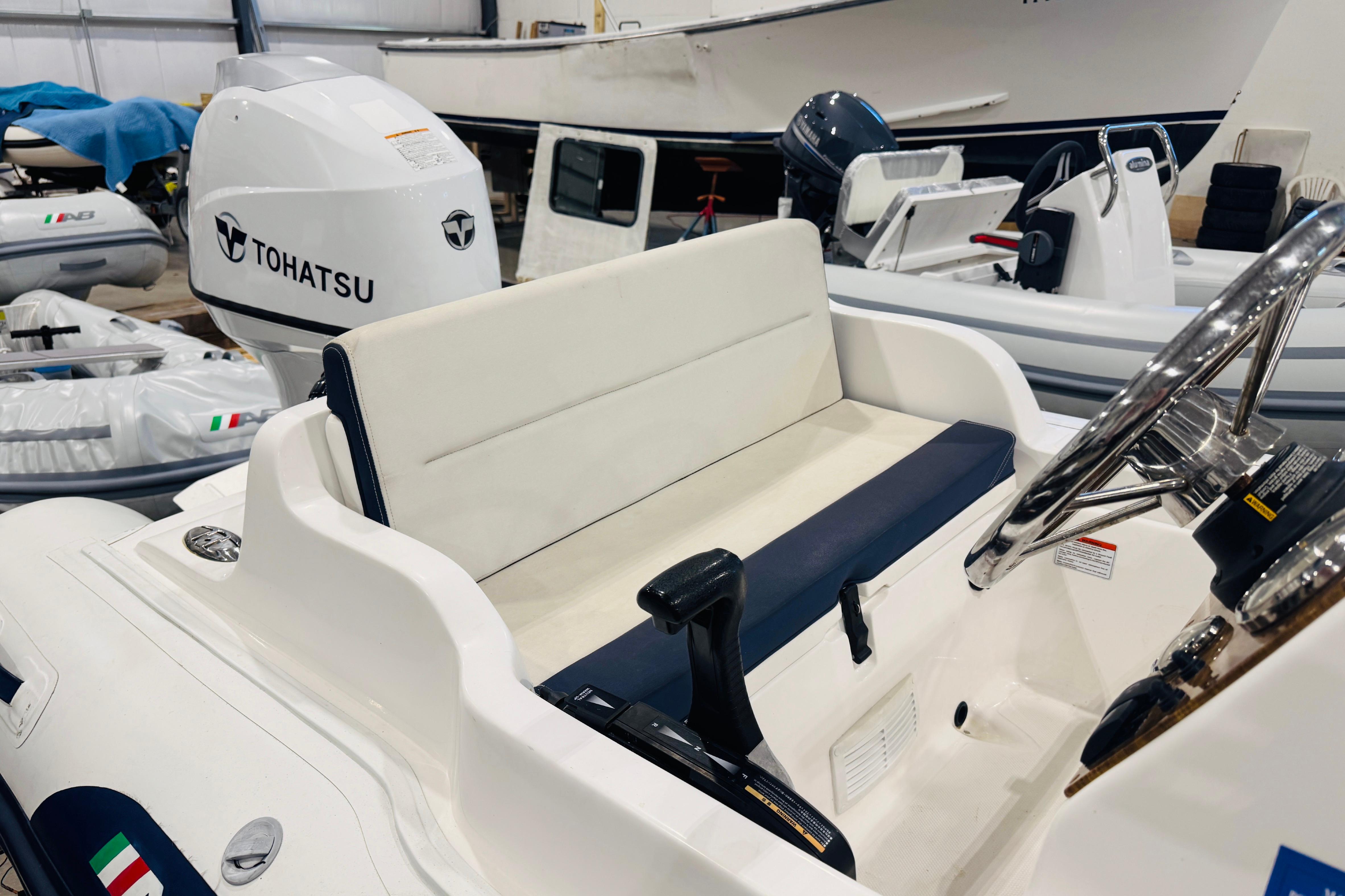 2019 AB Inflatables Nautilus 11 DLX boat with Tohatsu engine in showroom.