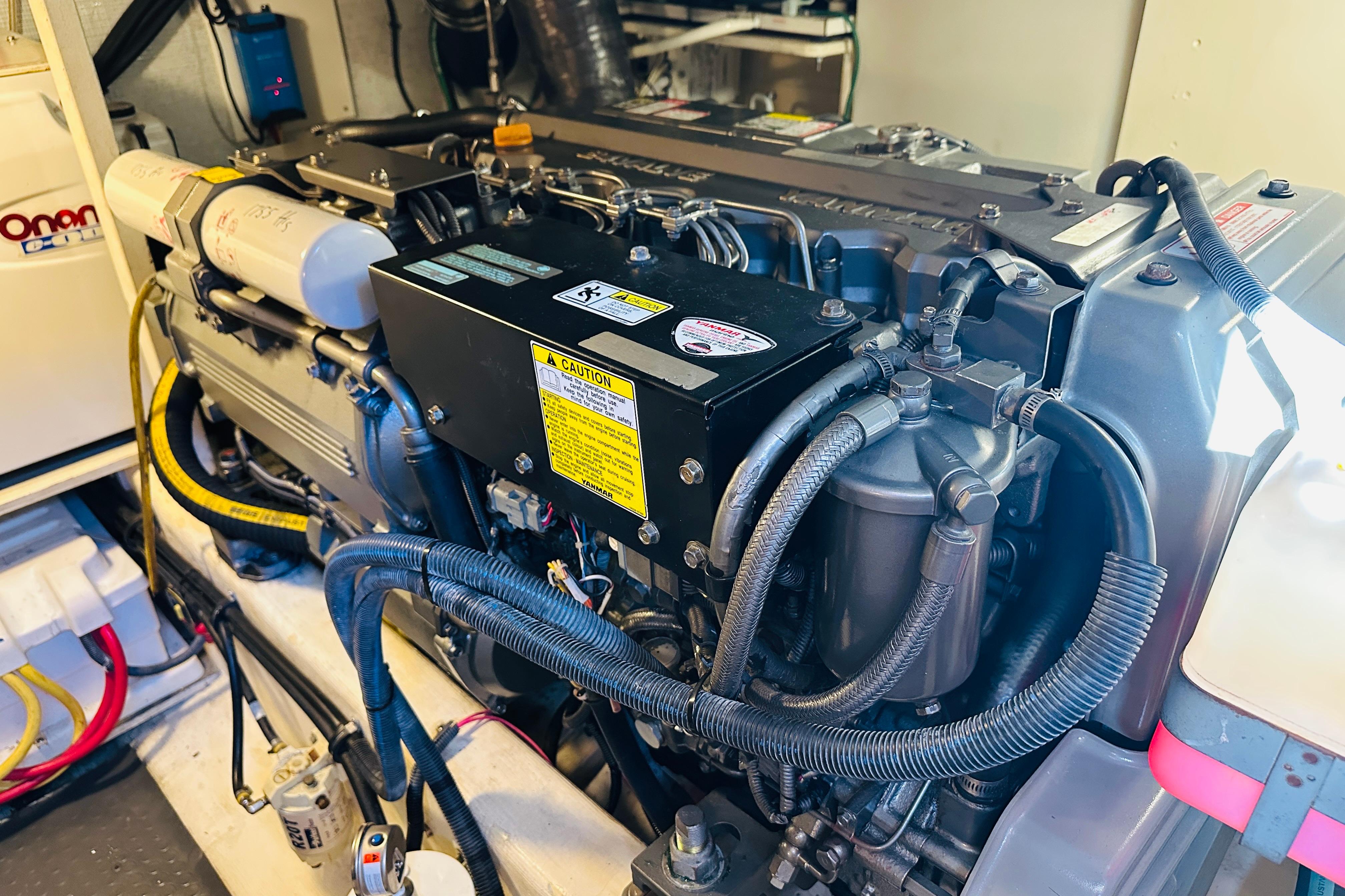 Engine room of 2006 Sabre 42 Fly Bridge with detailed mechanical components.