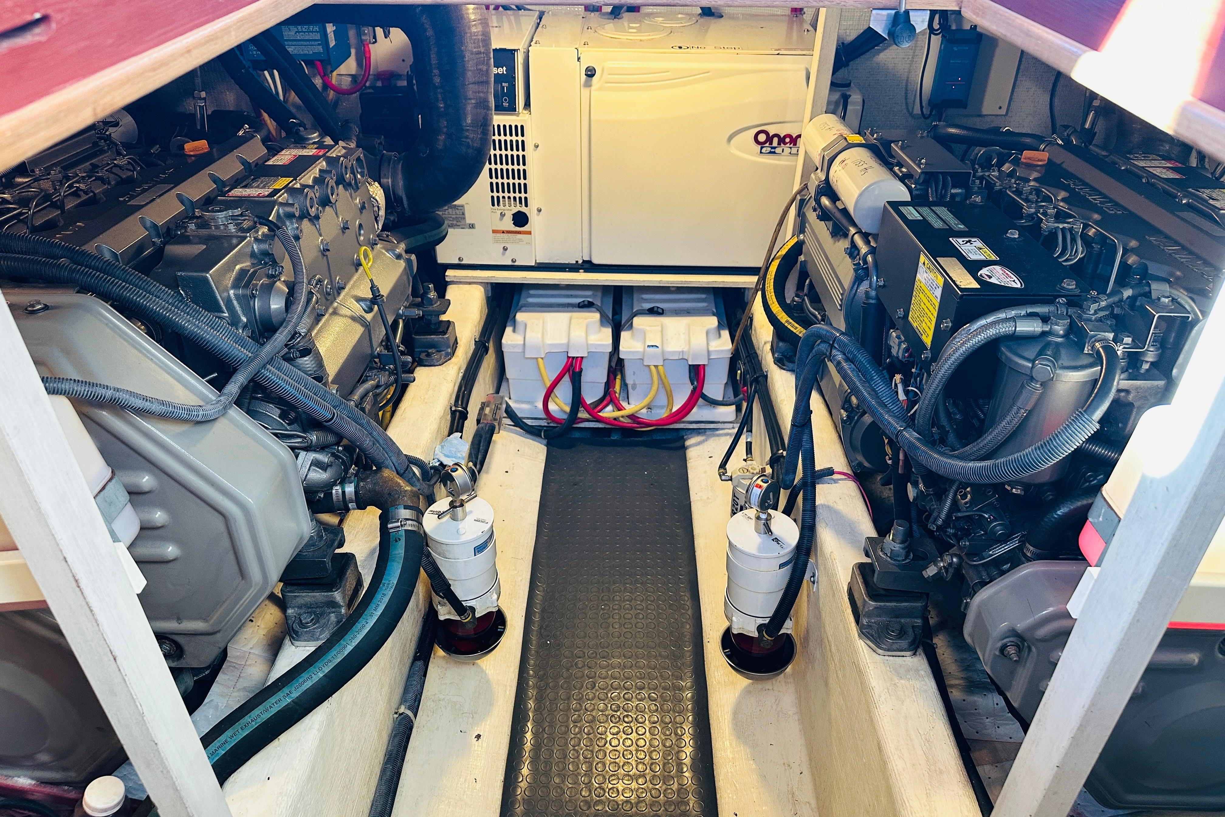 Engine room of 2006 Sabre 42 Fly Bridge with dual engines and generator.